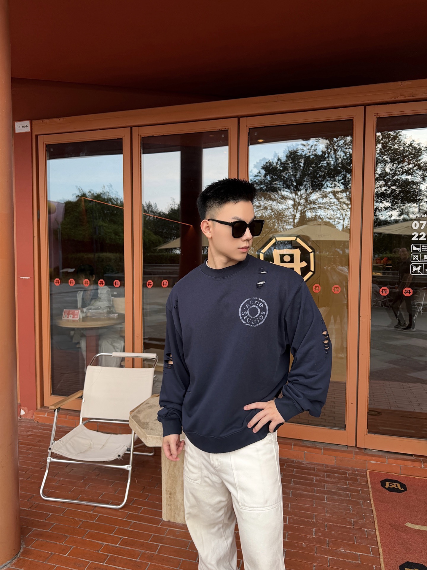 Small Circle Logo Distressed Sweatshirt — product photograph