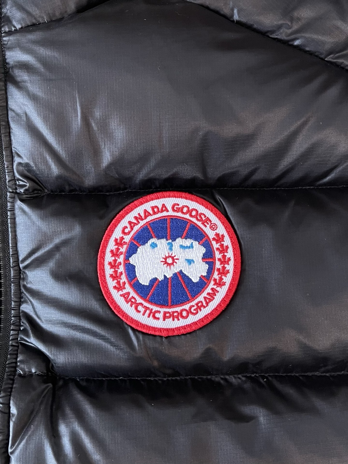 Crest-Patch Quilted Vest — product photograph