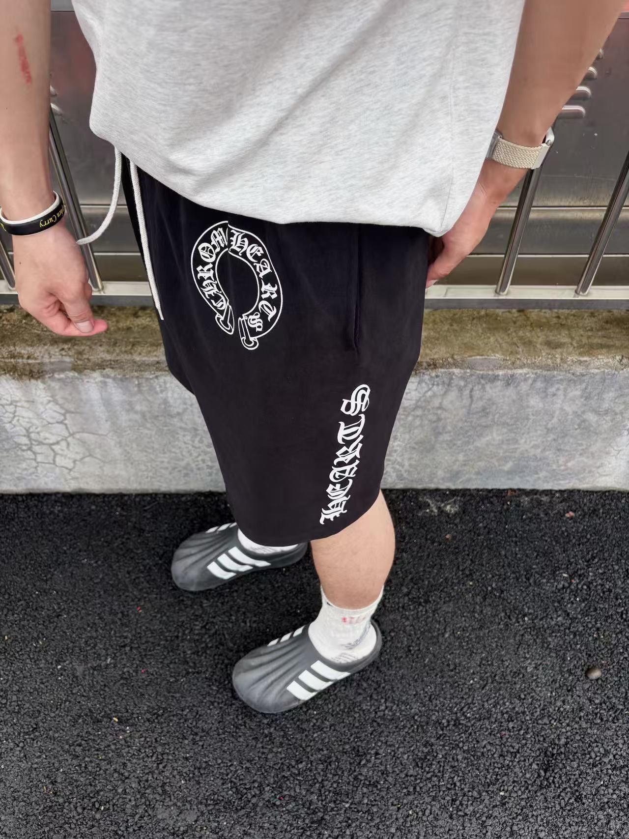 Horseshoe Crest Drawstring Shorts — product photograph