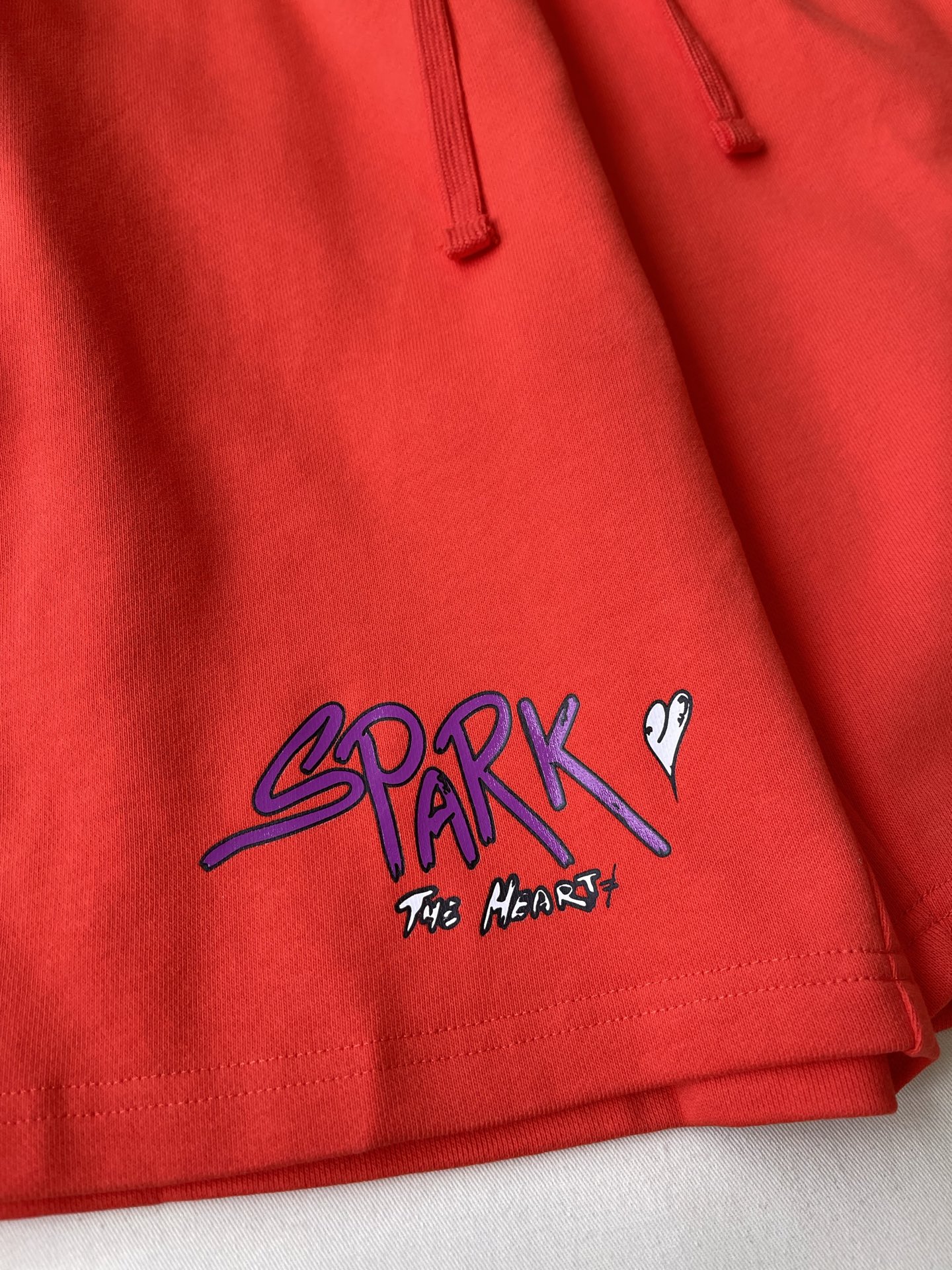 Graffiti Hem Drawstring Shorts — product photograph
