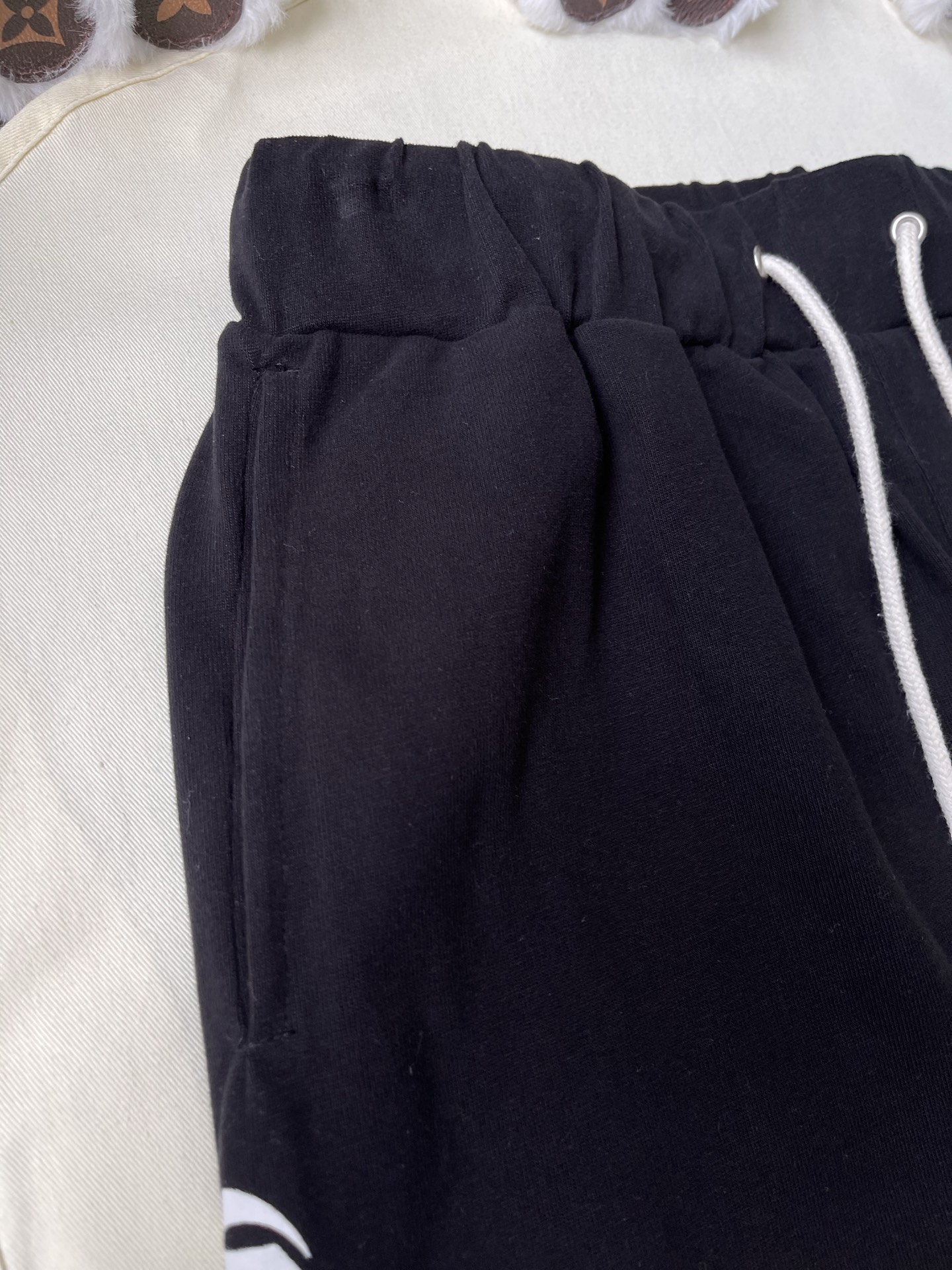 Horseshoe Crest Drawstring Shorts — product photograph