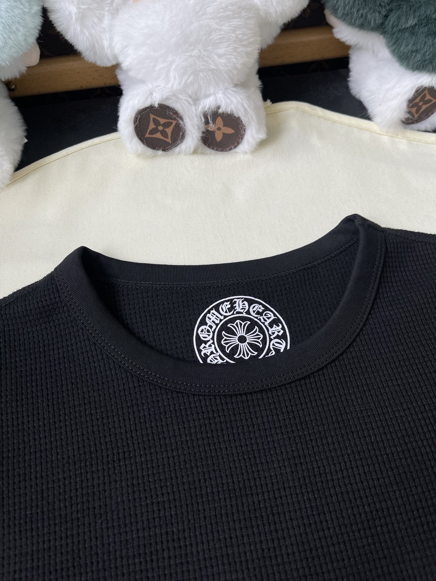 Horseshoe Crest Long-Sleeve Top — product photograph