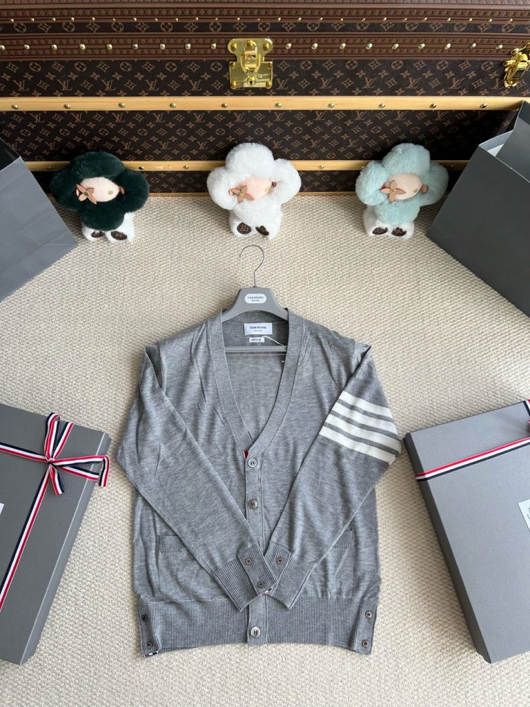 Four-Bar Pocket V-Neck Cardigan — product photograph