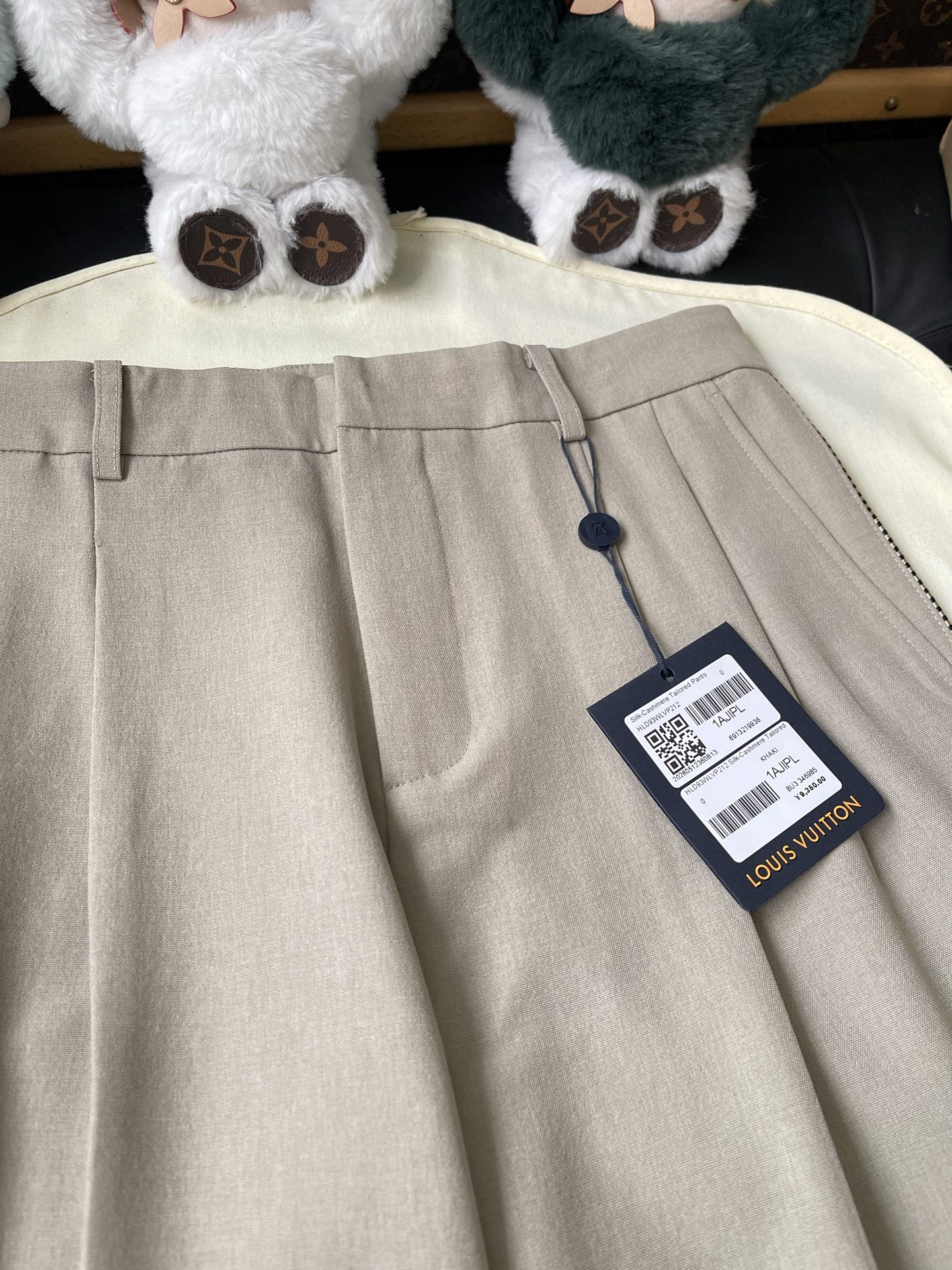 Pleated Wide-Leg Trousers — product photograph