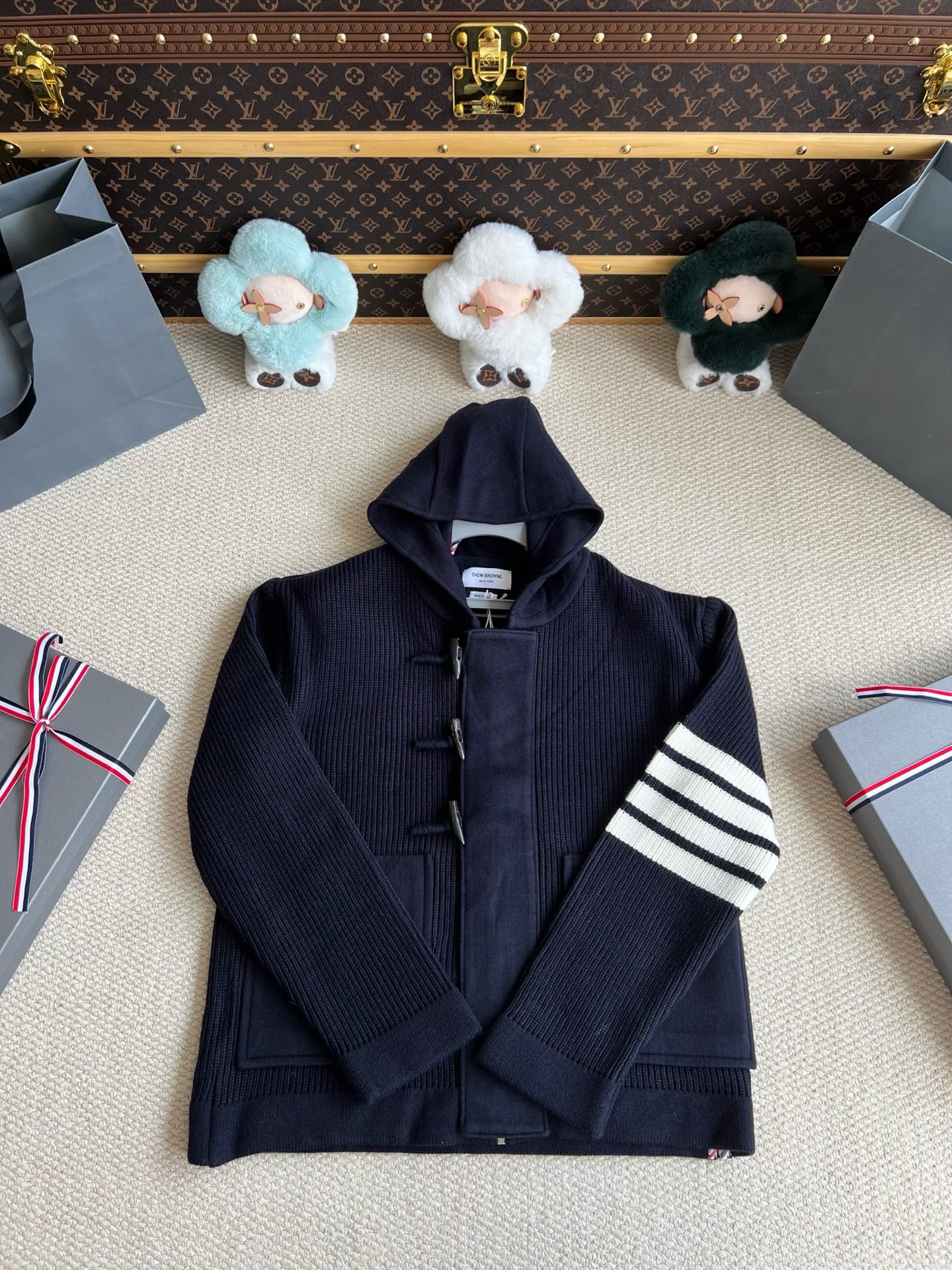 Four-Bar Hooded Knit Jacket — product photograph