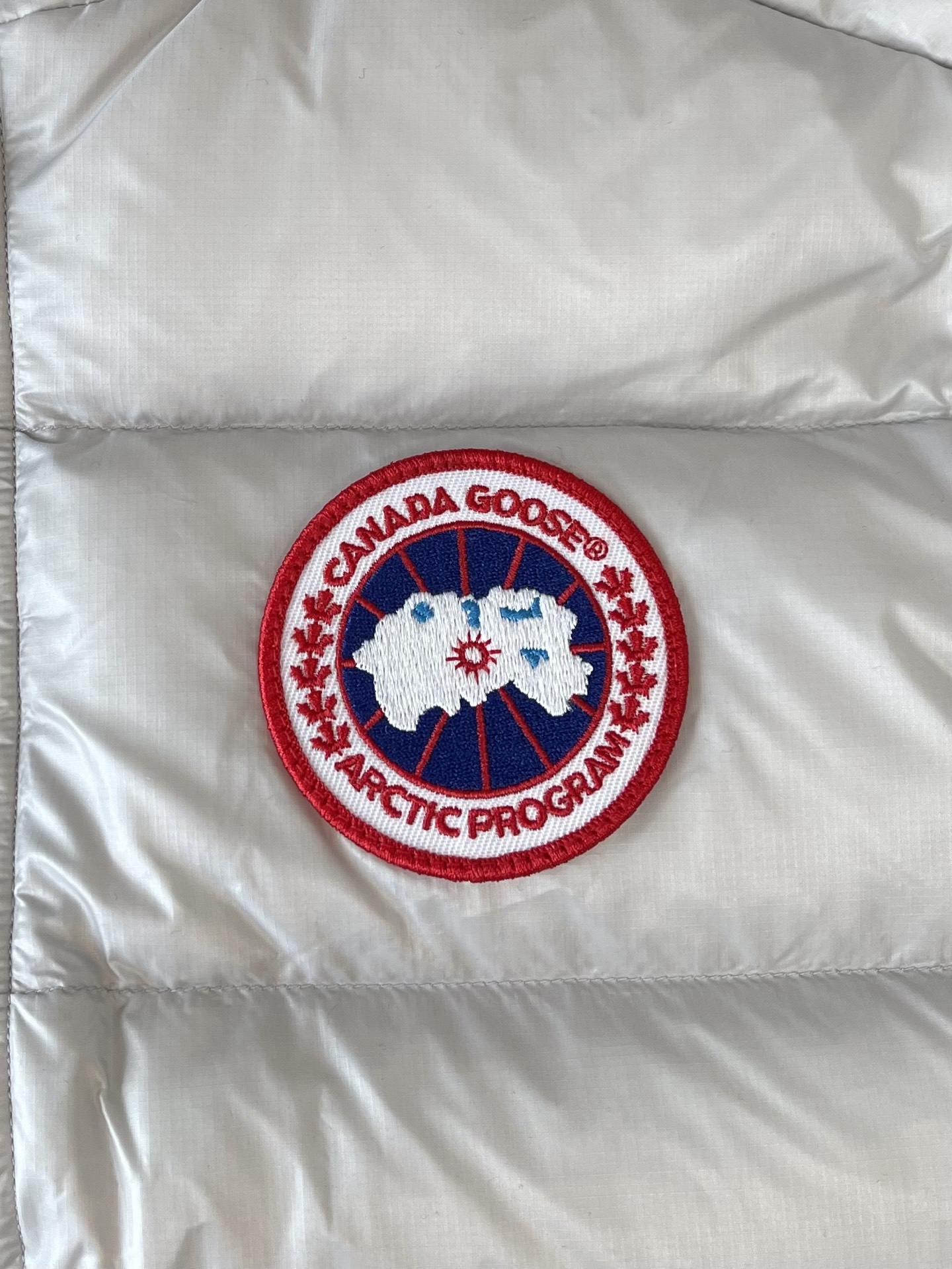 Crest-Patch Quilted Vest — product photograph