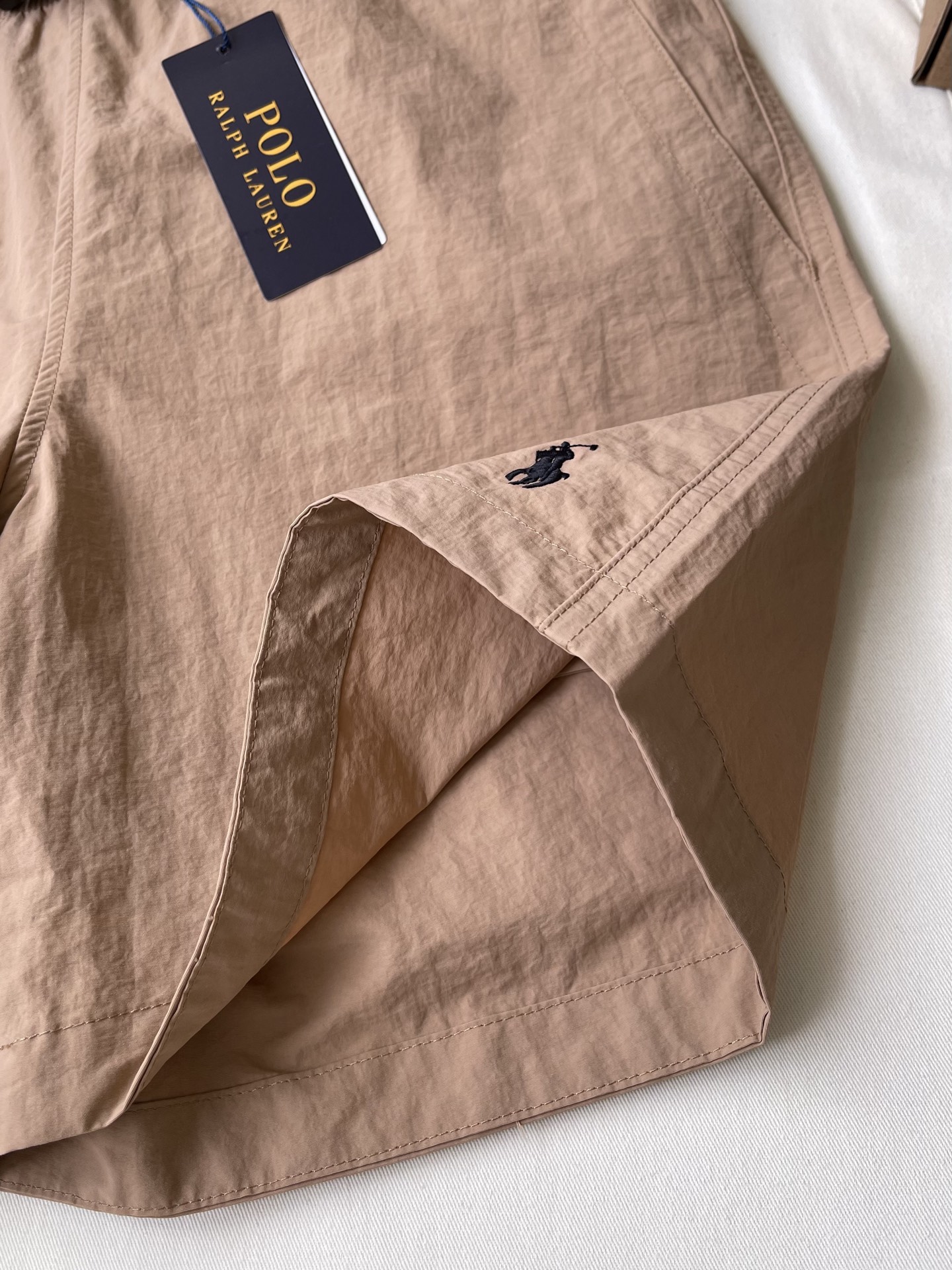 Logo-Hem Tailored Shorts — product photograph