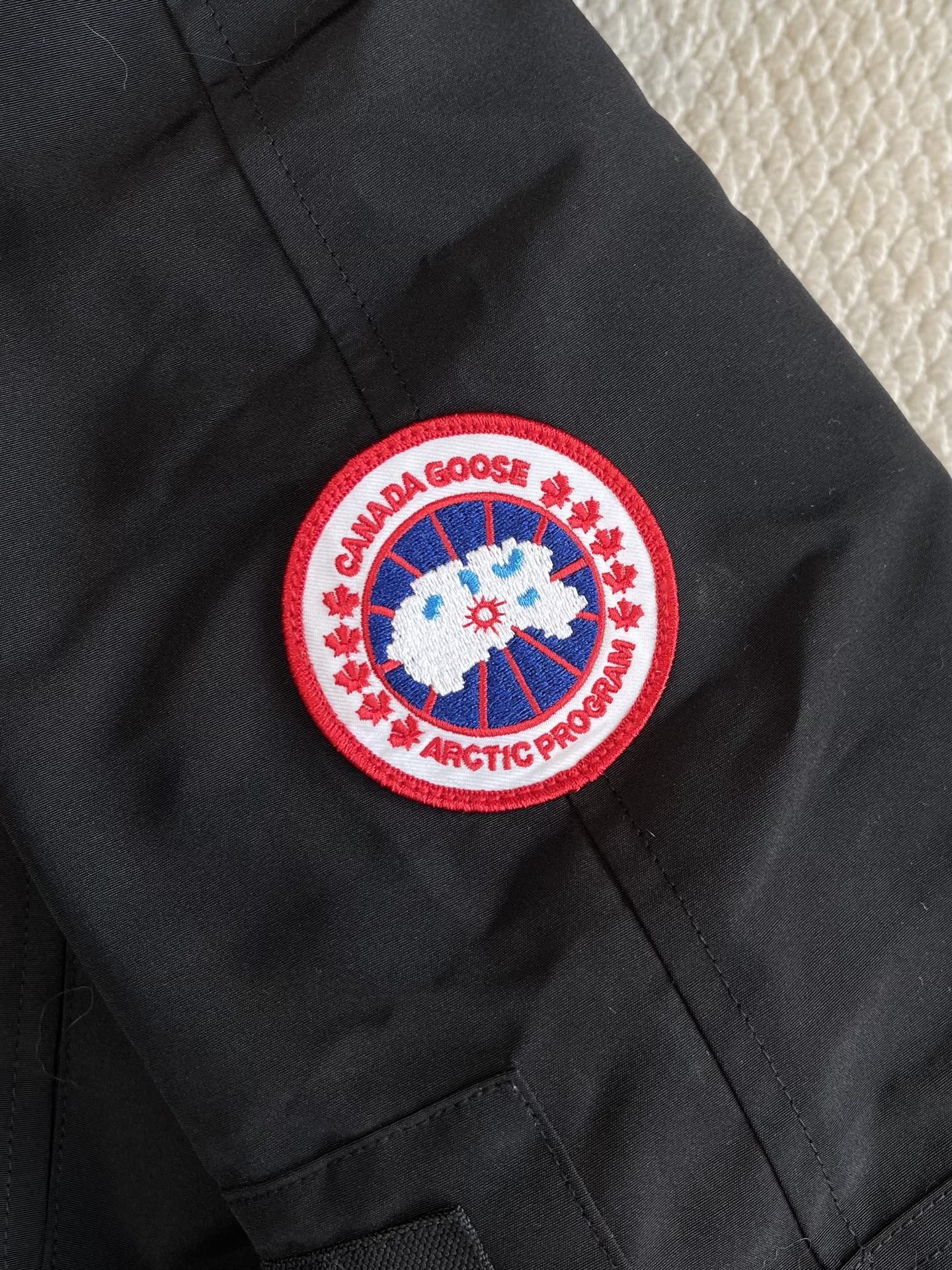 Trimmed-Hood Bomber Jacket — product photograph