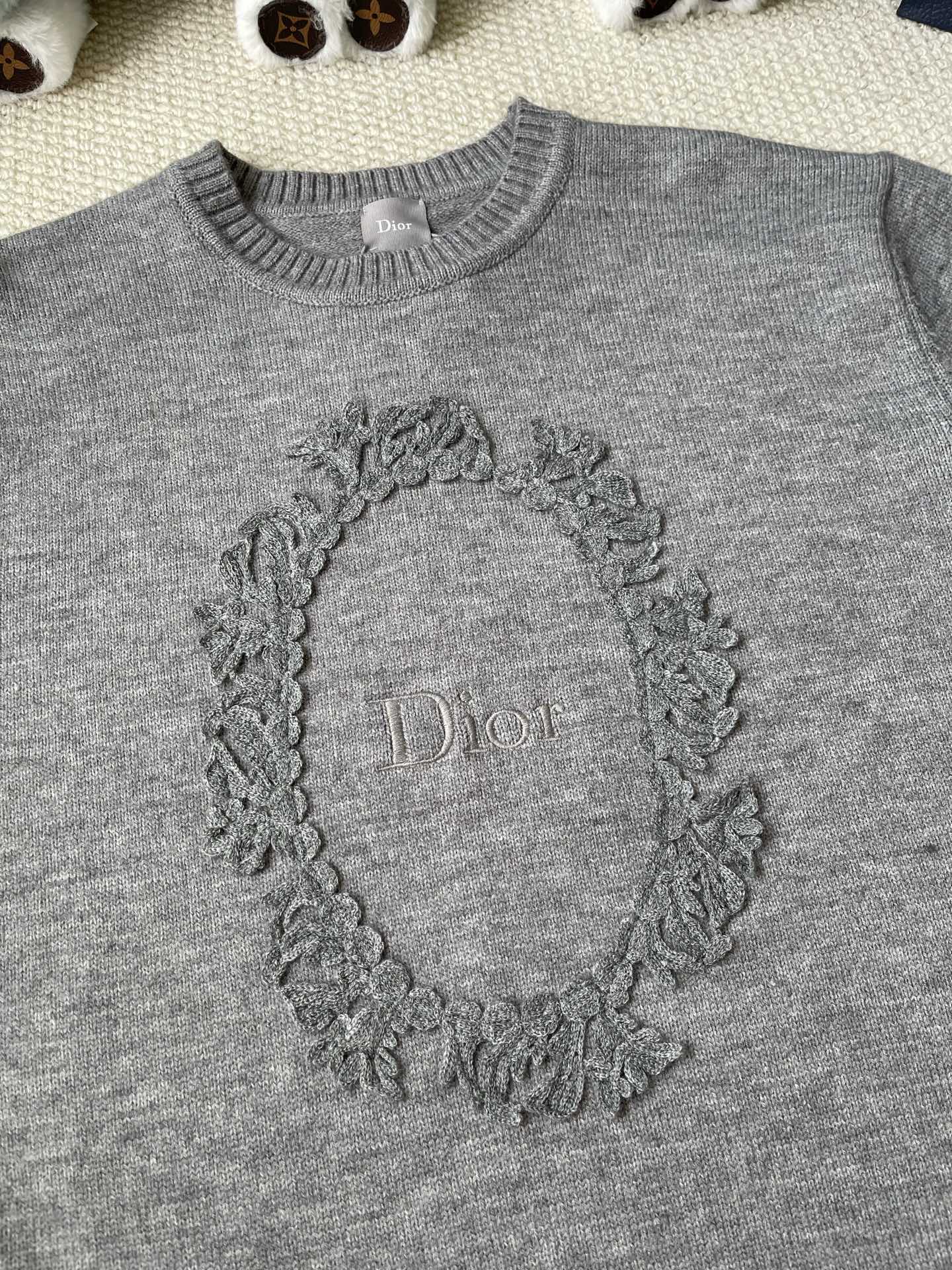 Wreath-Emblem Crewneck Sweater — product photograph