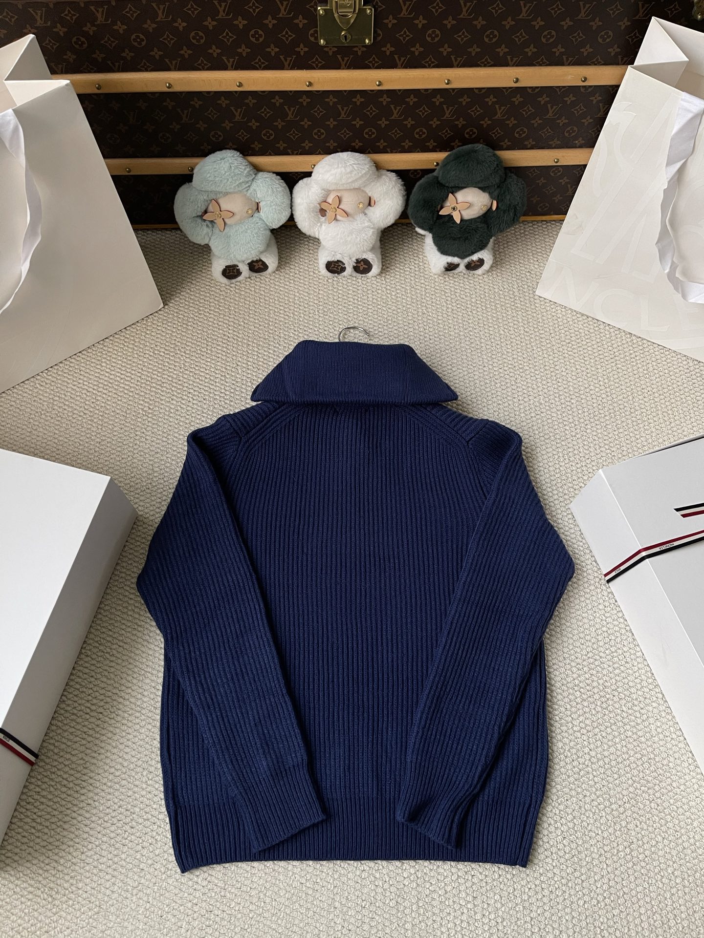 Ribbed Badge Quarter-Zip Sweater — product photograph