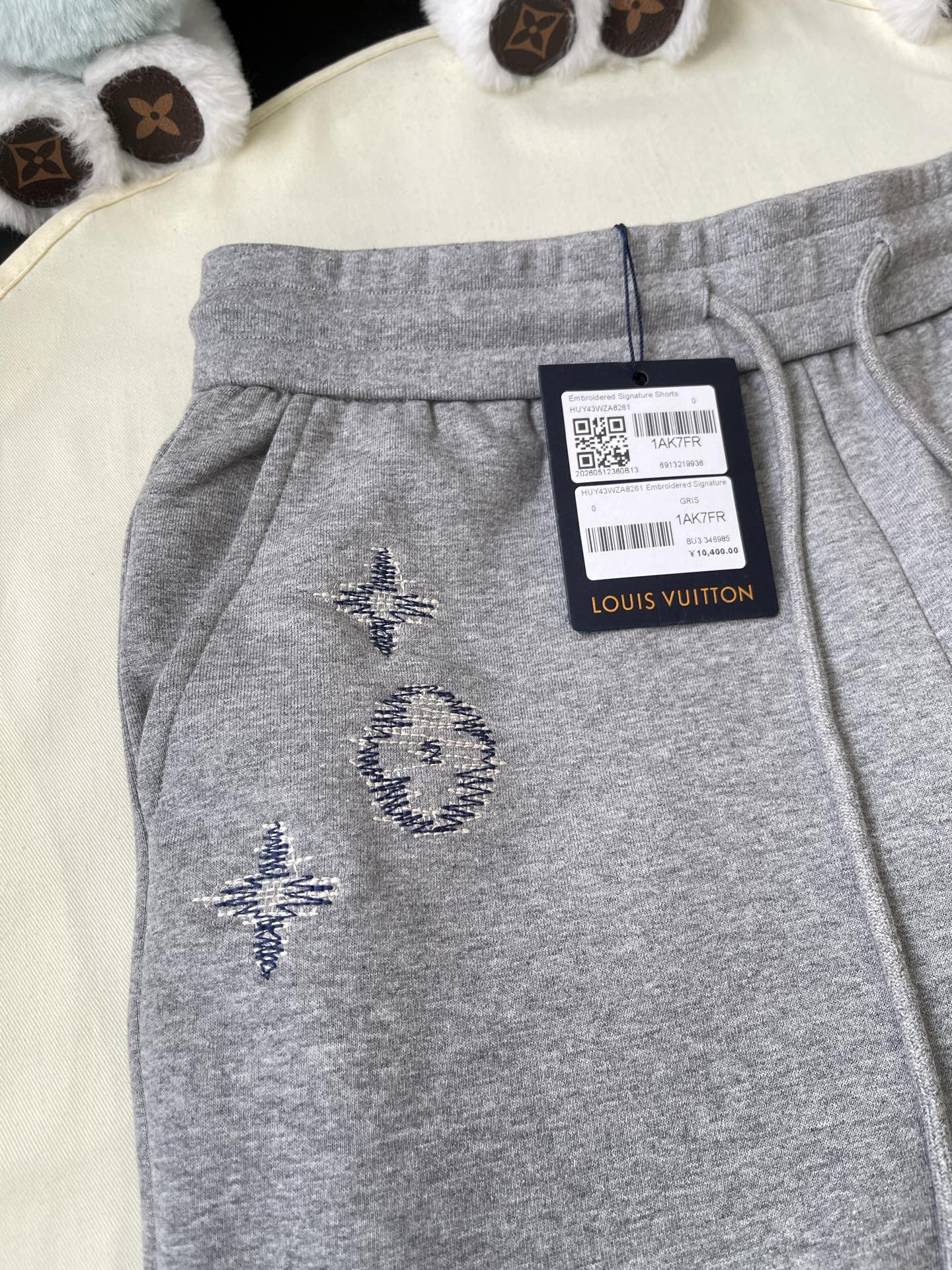 Scattered Monogram Sweatshorts — product photograph