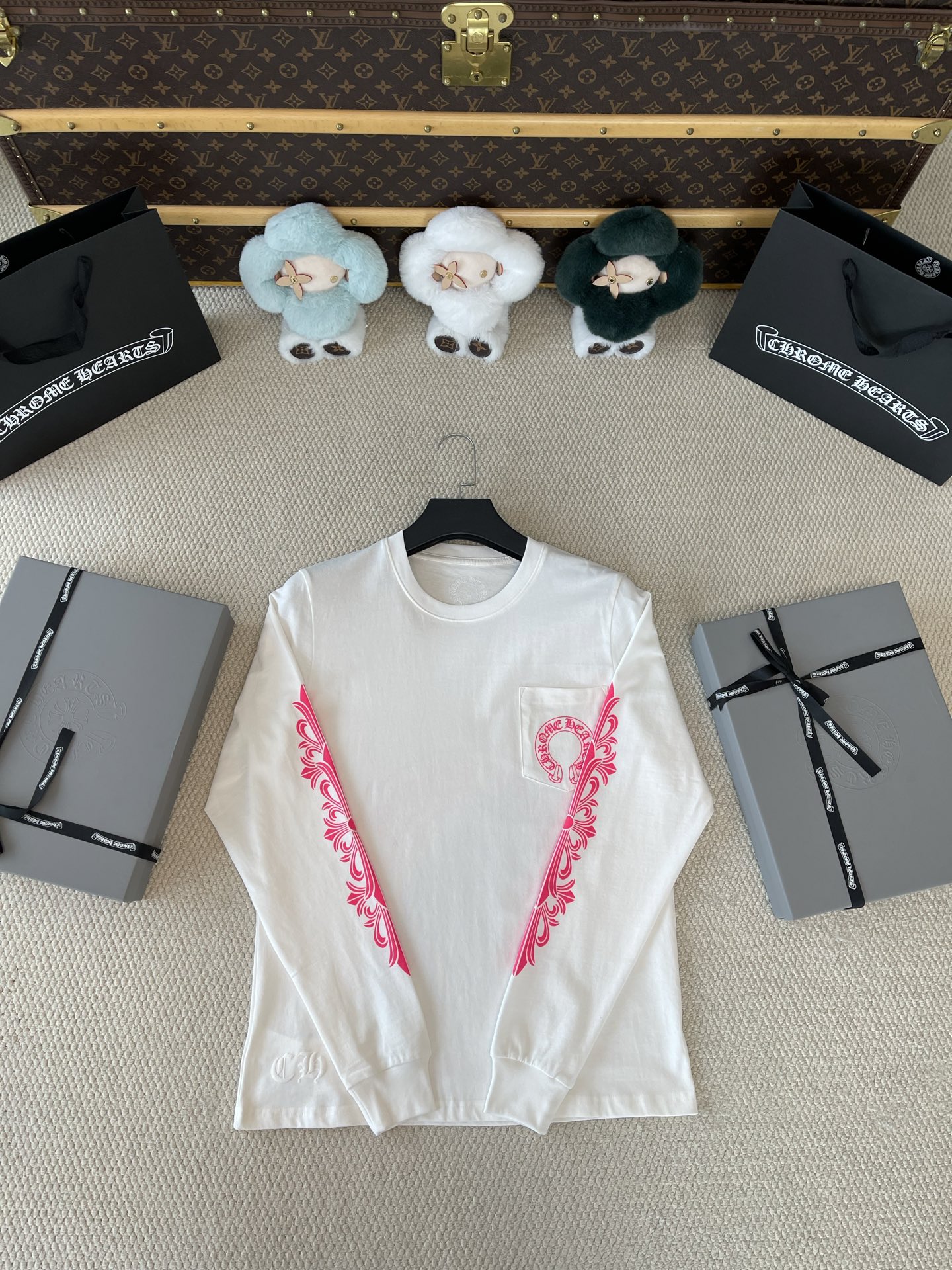 Pink Floral-Sleeve Horseshoe T-Shirt — product photograph