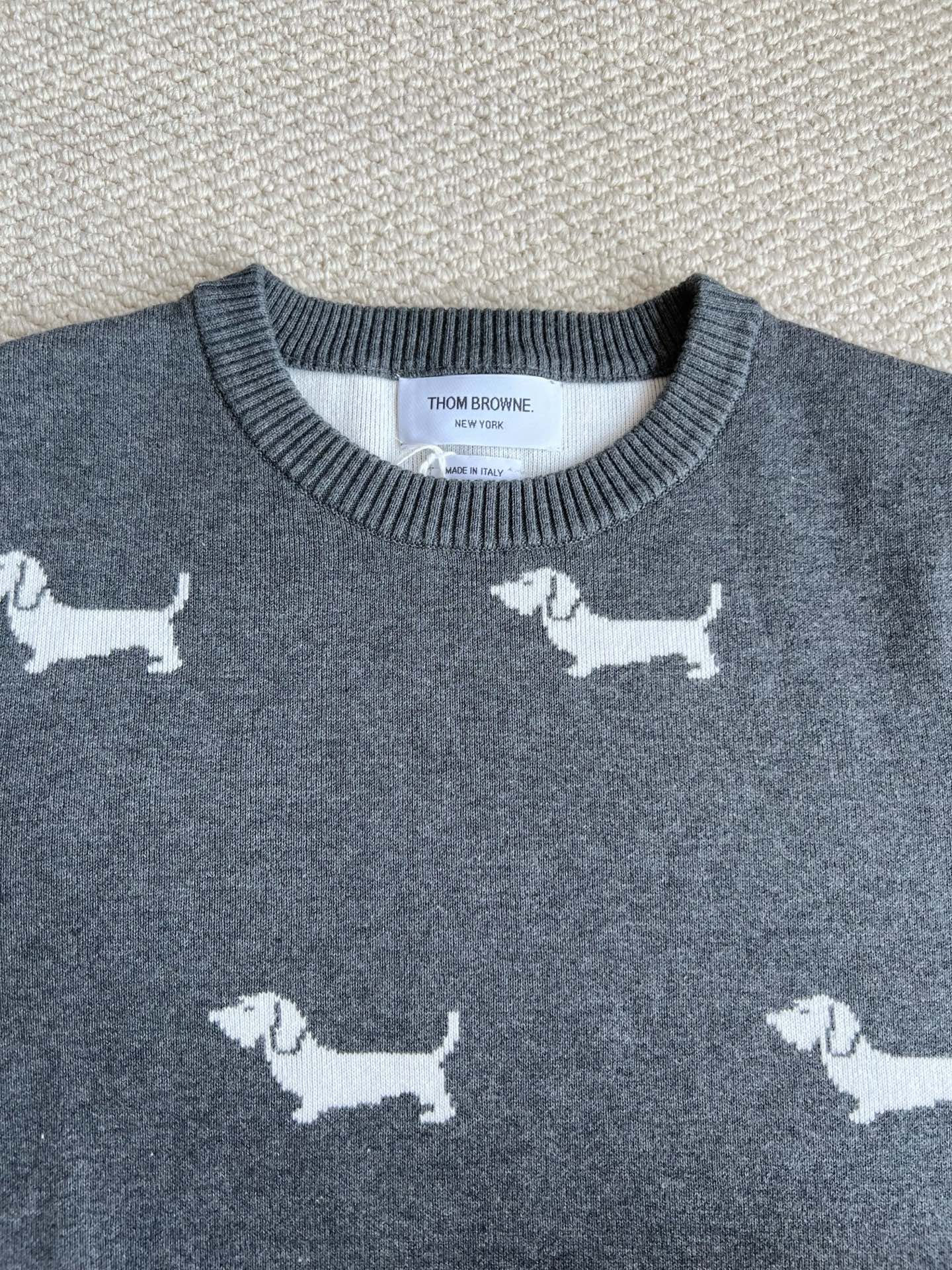 Allover Dog-Motif Four-Bar Sweater — product photograph