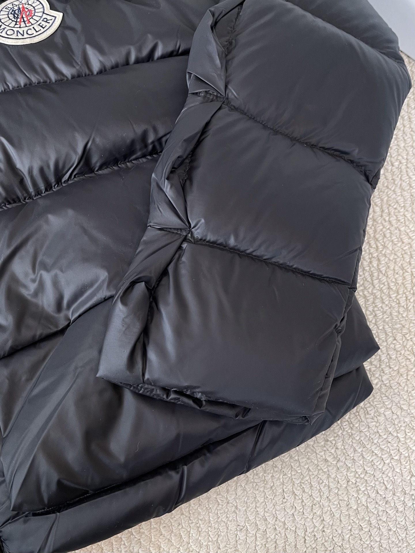 Crest-Patch Stand-Collar Puffer — product photograph