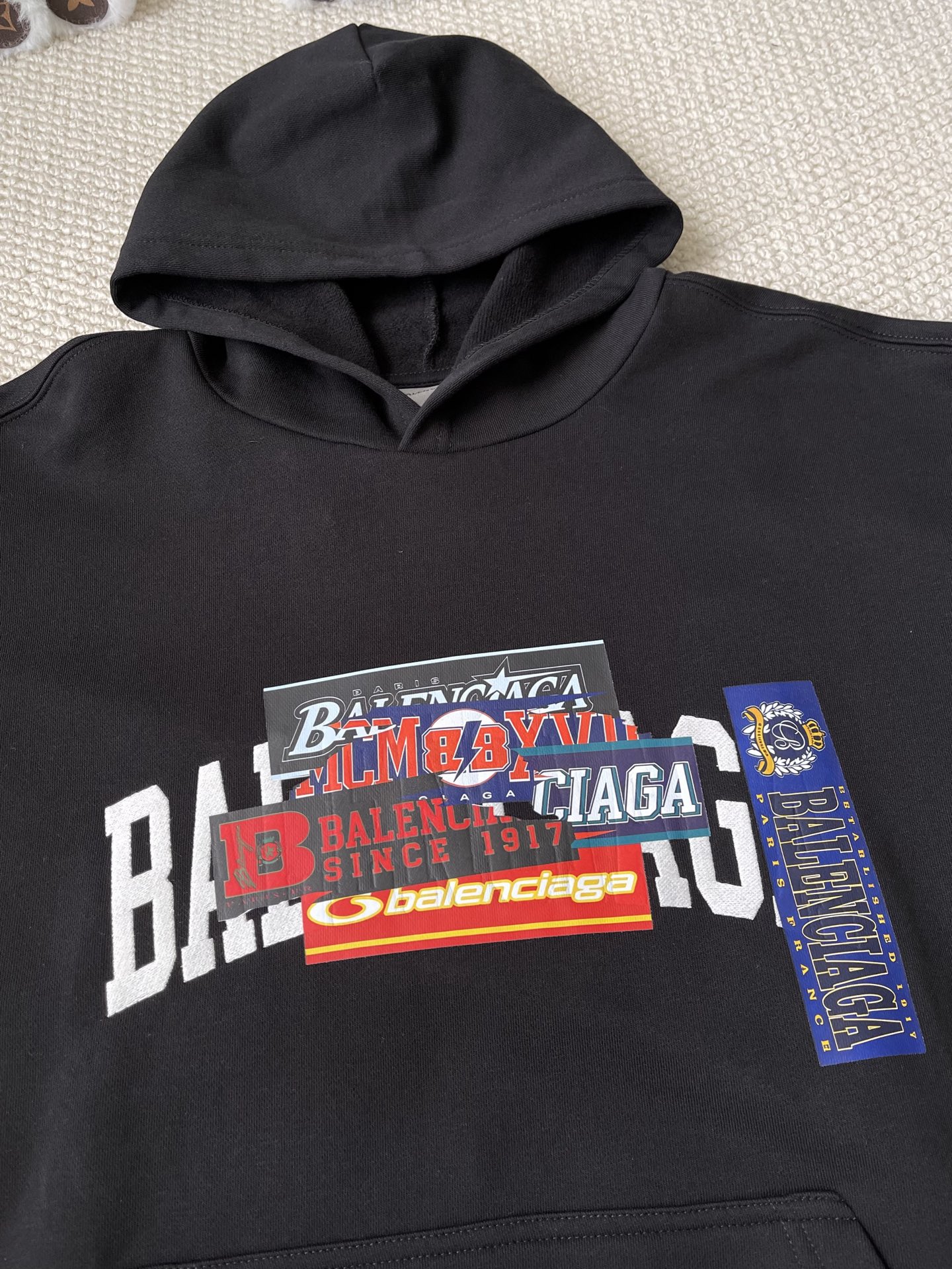 Collage-Wordmark Pullover Hoodie — product photograph