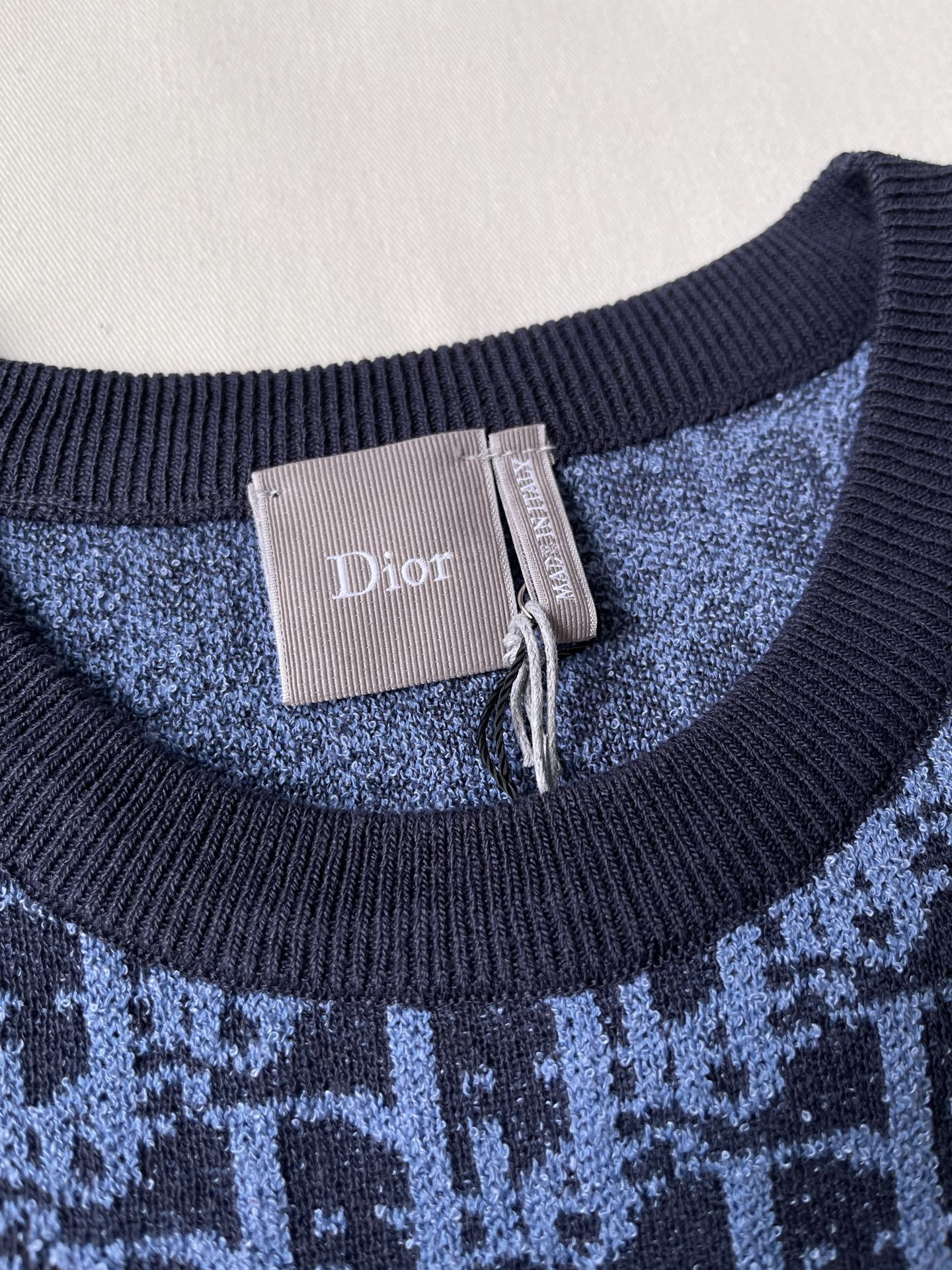 Oblique Pattern Short-Sleeve Knit Top — product photograph