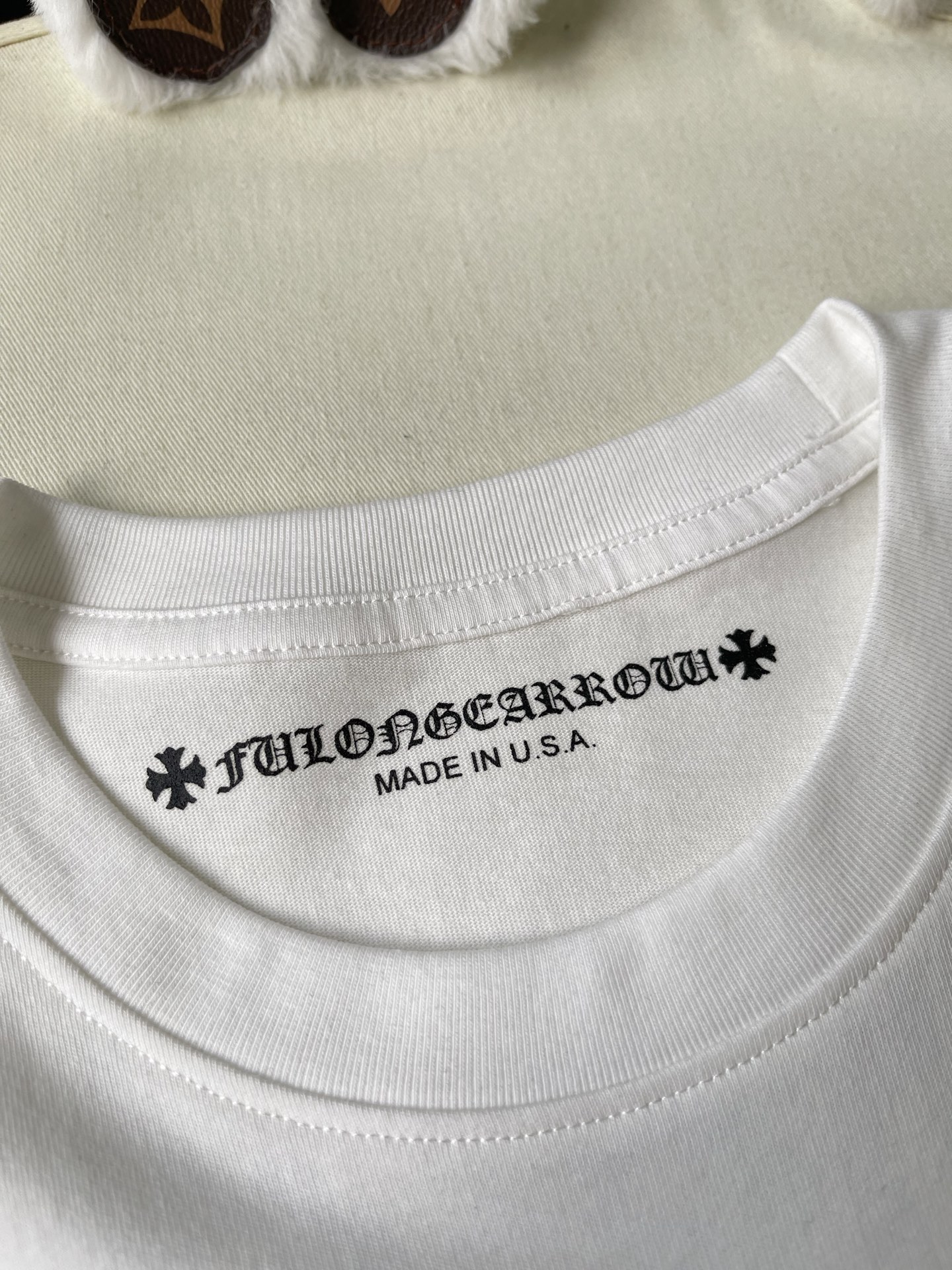 Blue Crest Back-Print Pocket T-Shirt — product photograph