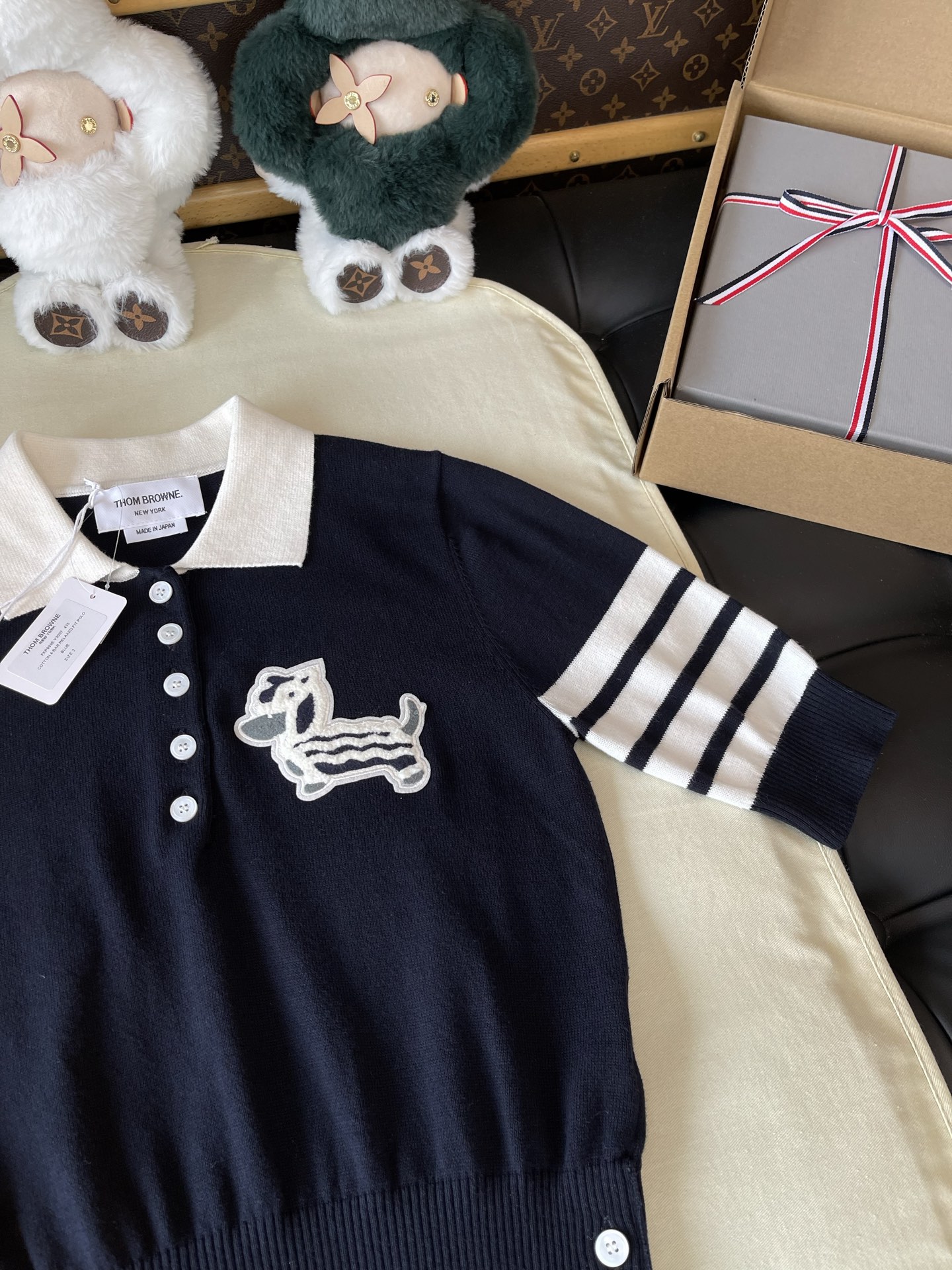 Dachshund Crest Four-Bar Knit Polo — product photograph