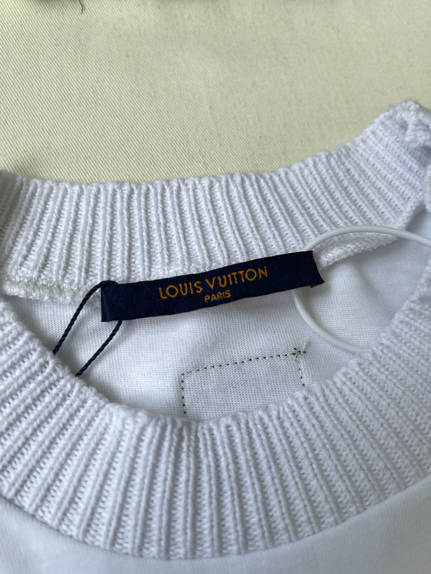 Crown-Pendant Short-Sleeve Knit Top — product photograph