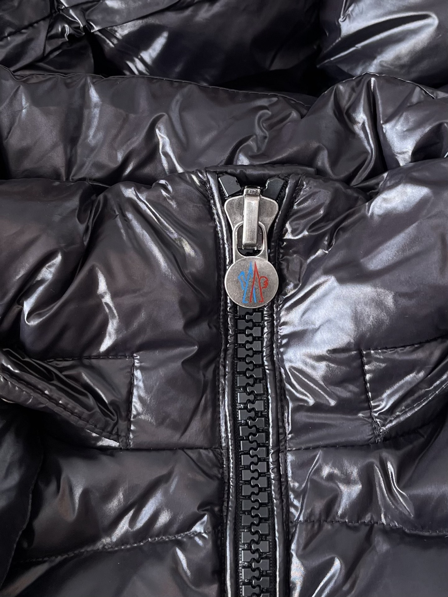 Gloss-Finish Sleeve-Pocket Puffer — product photograph