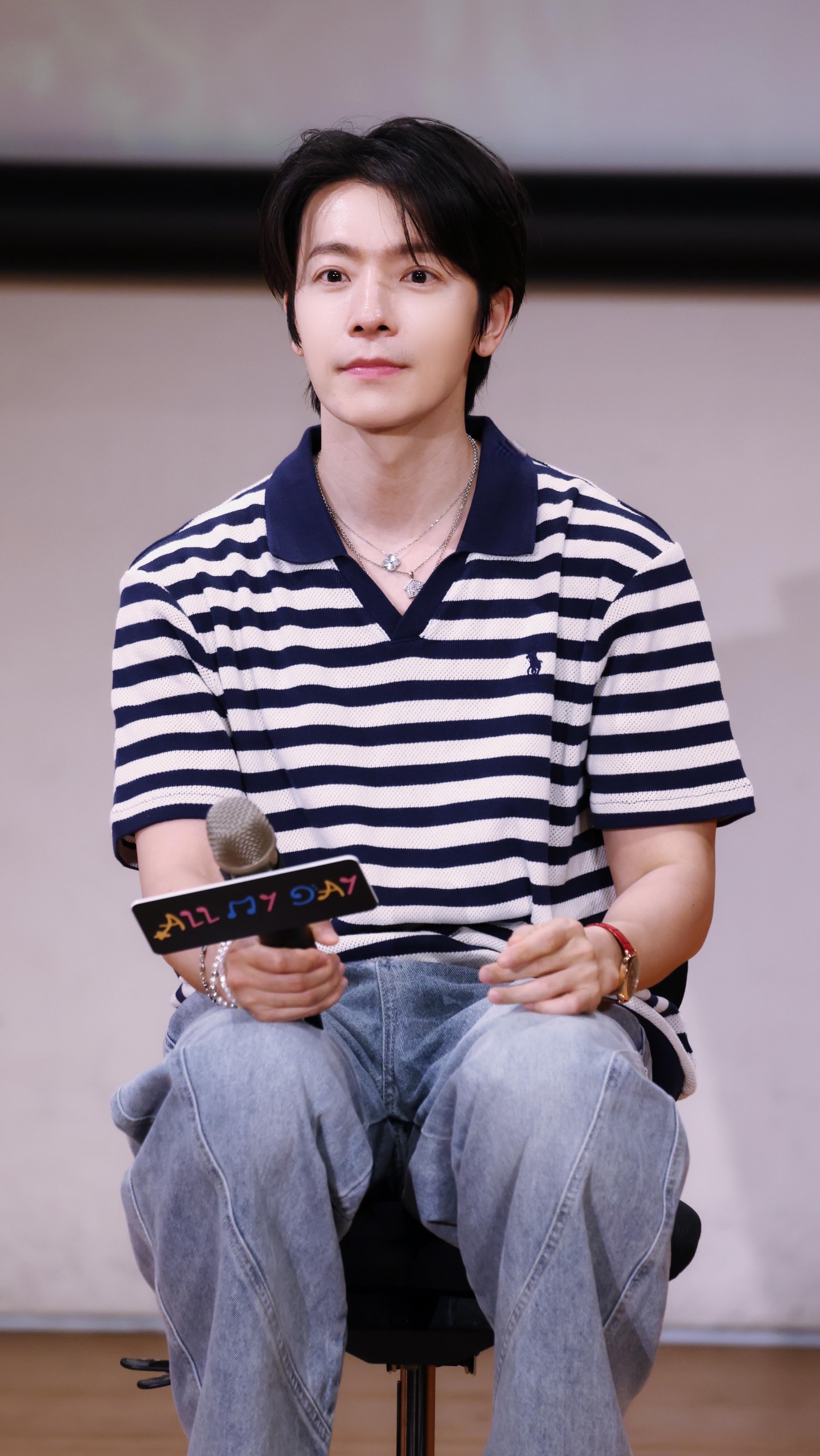 Striped Open-Neck Knit Polo — product photograph