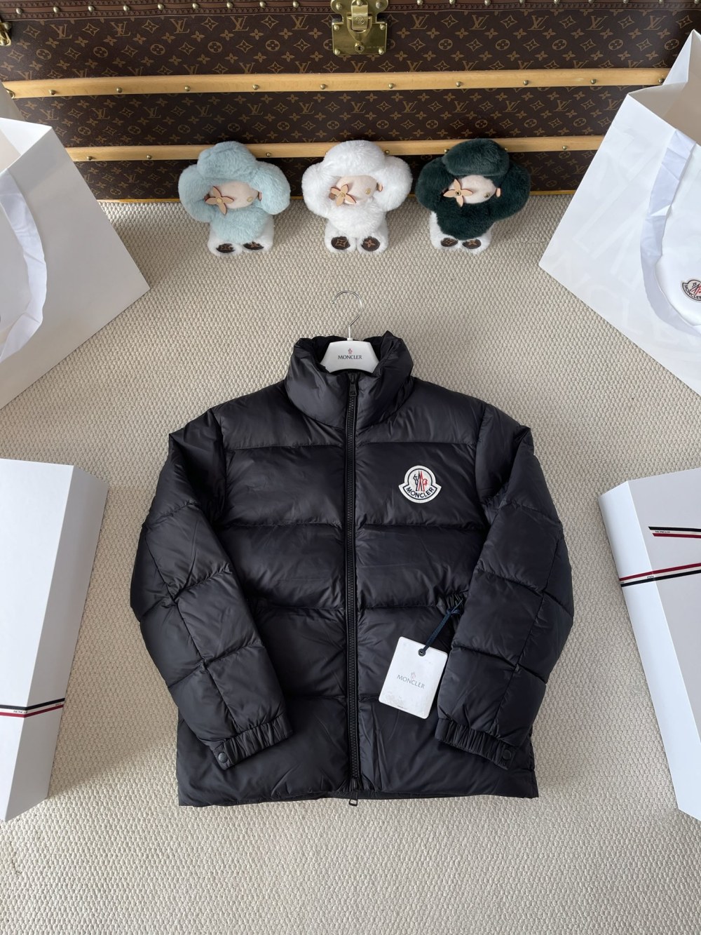 Large-Badge Stand-Collar Puffer — product photograph