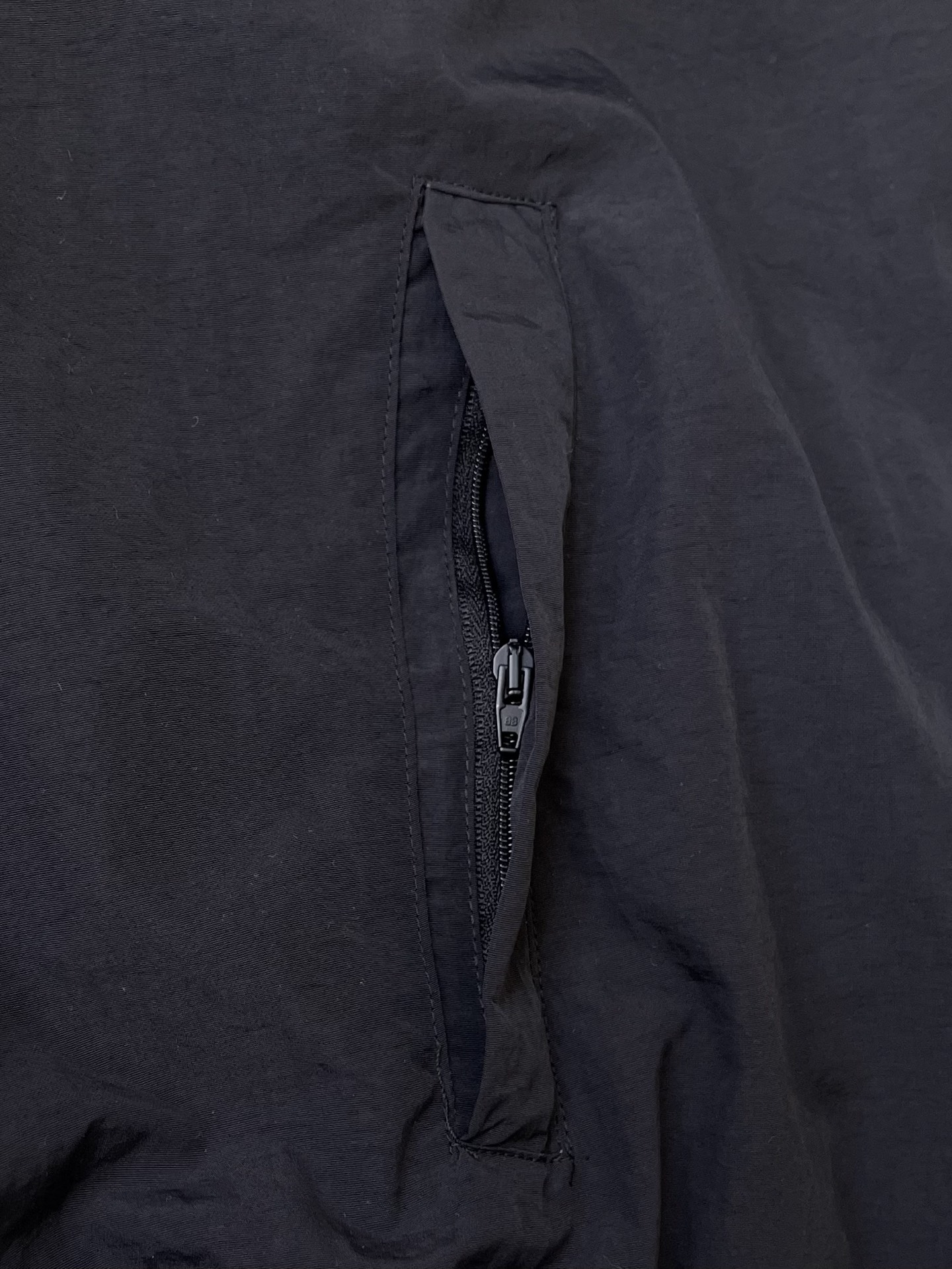 Paris-Script Hooded Windbreaker — product photograph
