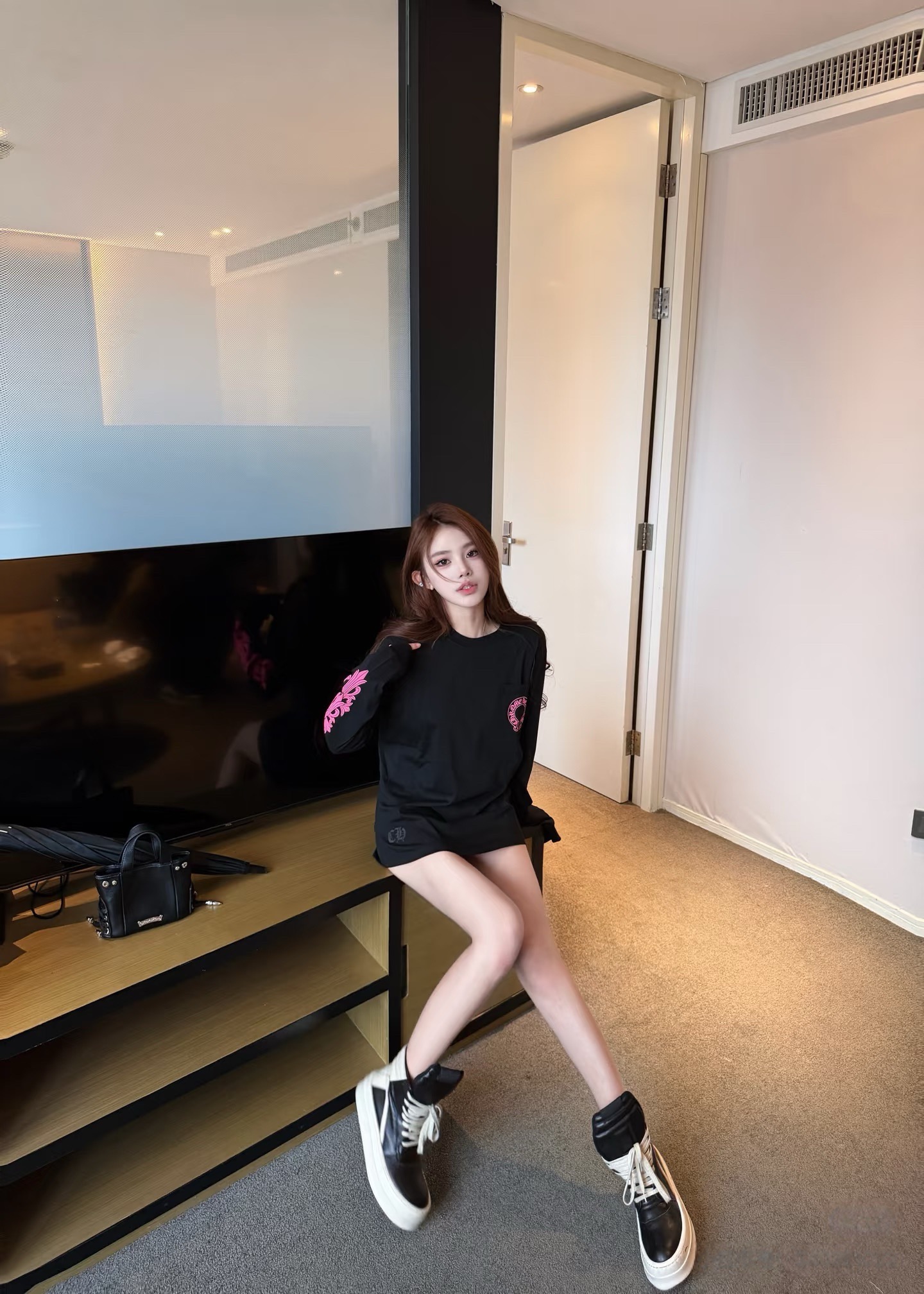 Pink Crest-Print Long-Sleeve T-Shirt — product photograph