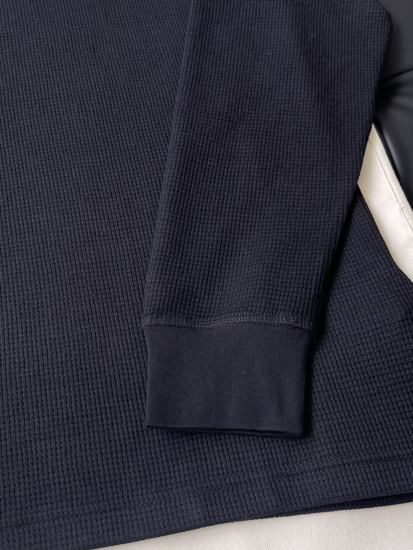 Horseshoe Crest Long-Sleeve Top — product photograph