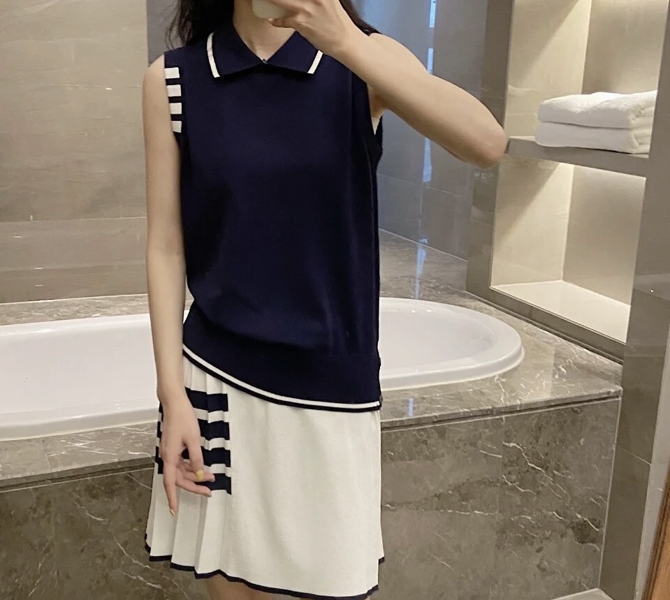 Contrast-Trim Sleeveless Zip Polo — product photograph