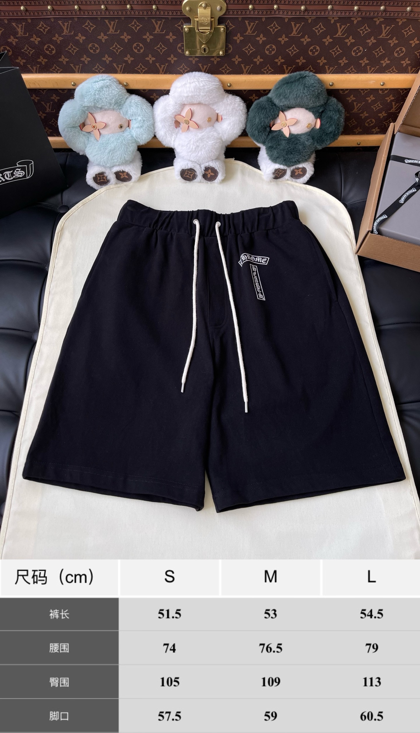 Dagger Emblem Drawstring Shorts — product photograph