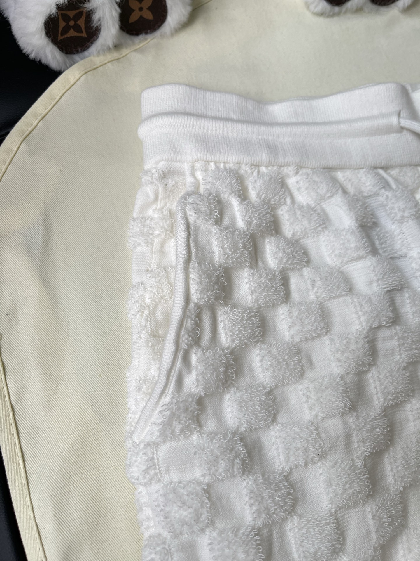 Checker-Texture Stripe-Hem Shorts — product photograph