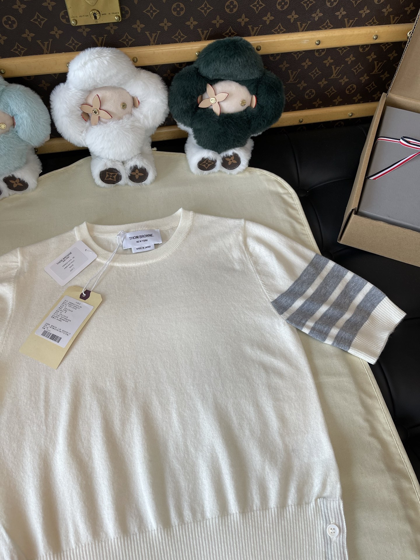 Four-Bar Sleeve Crewneck Knit Top — product photograph