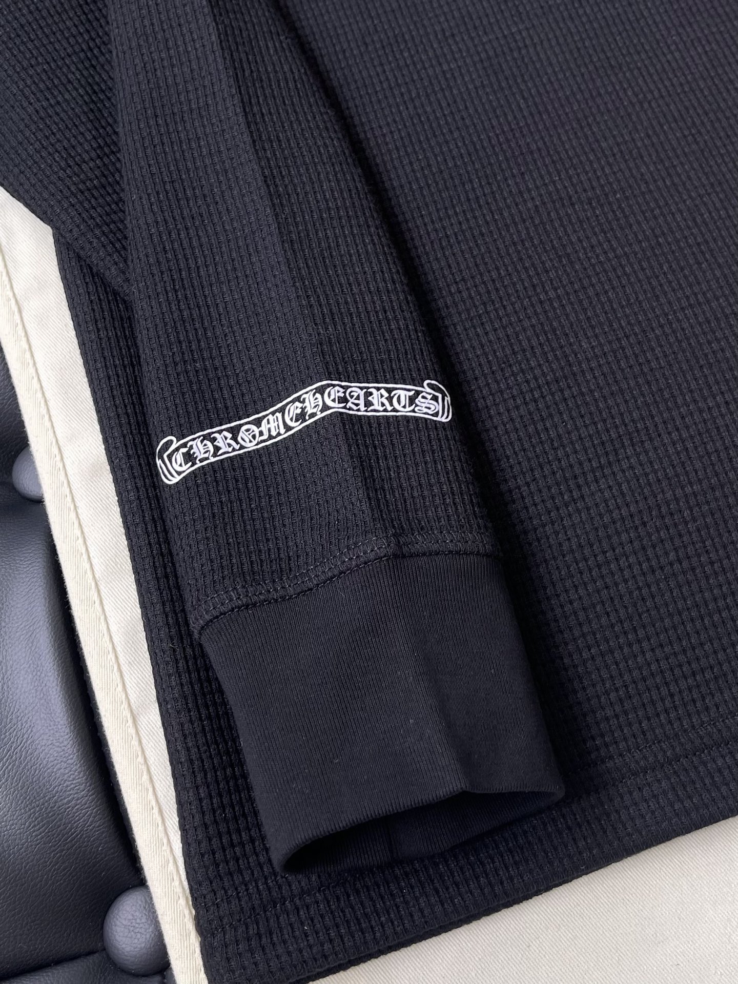 Horseshoe Crest Long-Sleeve Top — product photograph