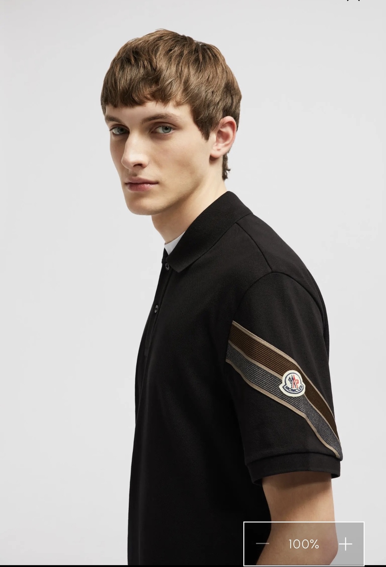 Stripe-Sleeve Badge Polo — product photograph