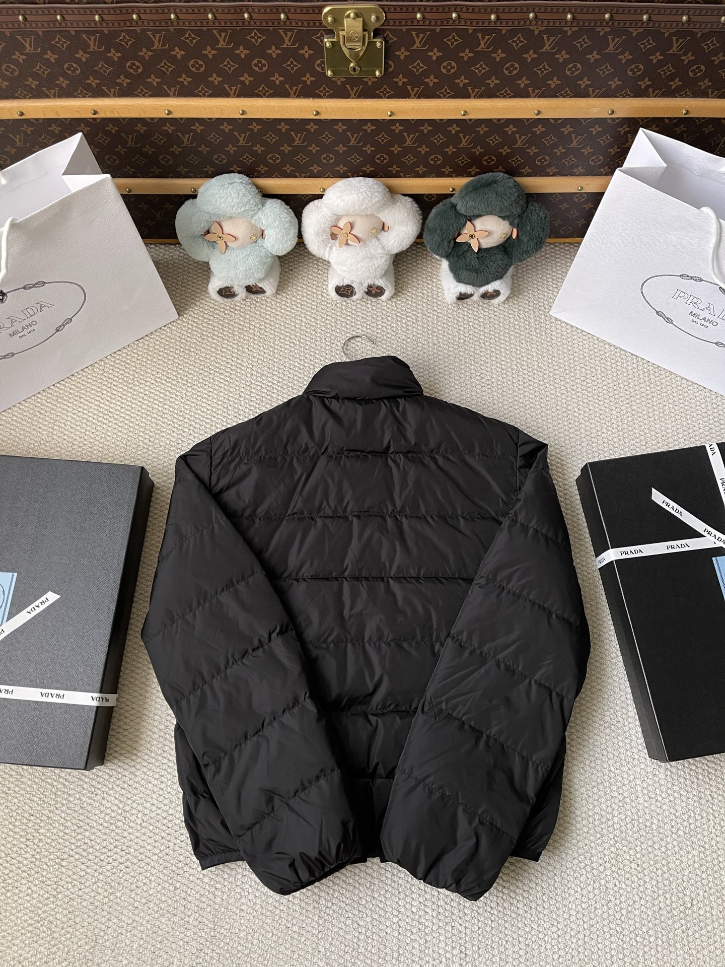 Triangle-Badge Zip-Pocket Puffer — product photograph