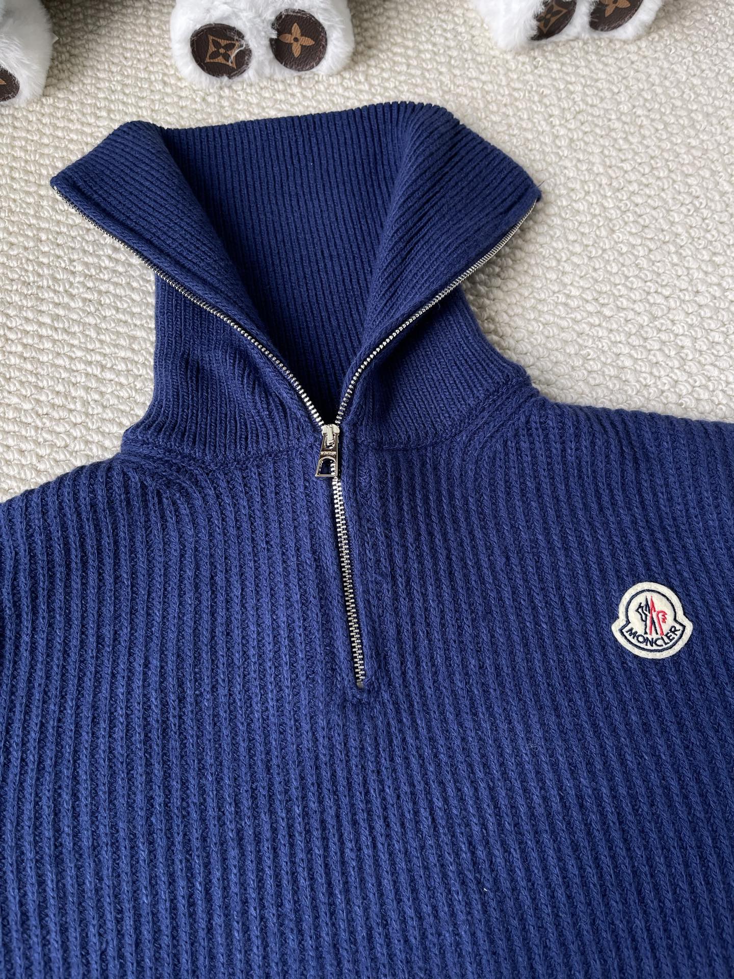 Ribbed Badge Quarter-Zip Sweater — product photograph