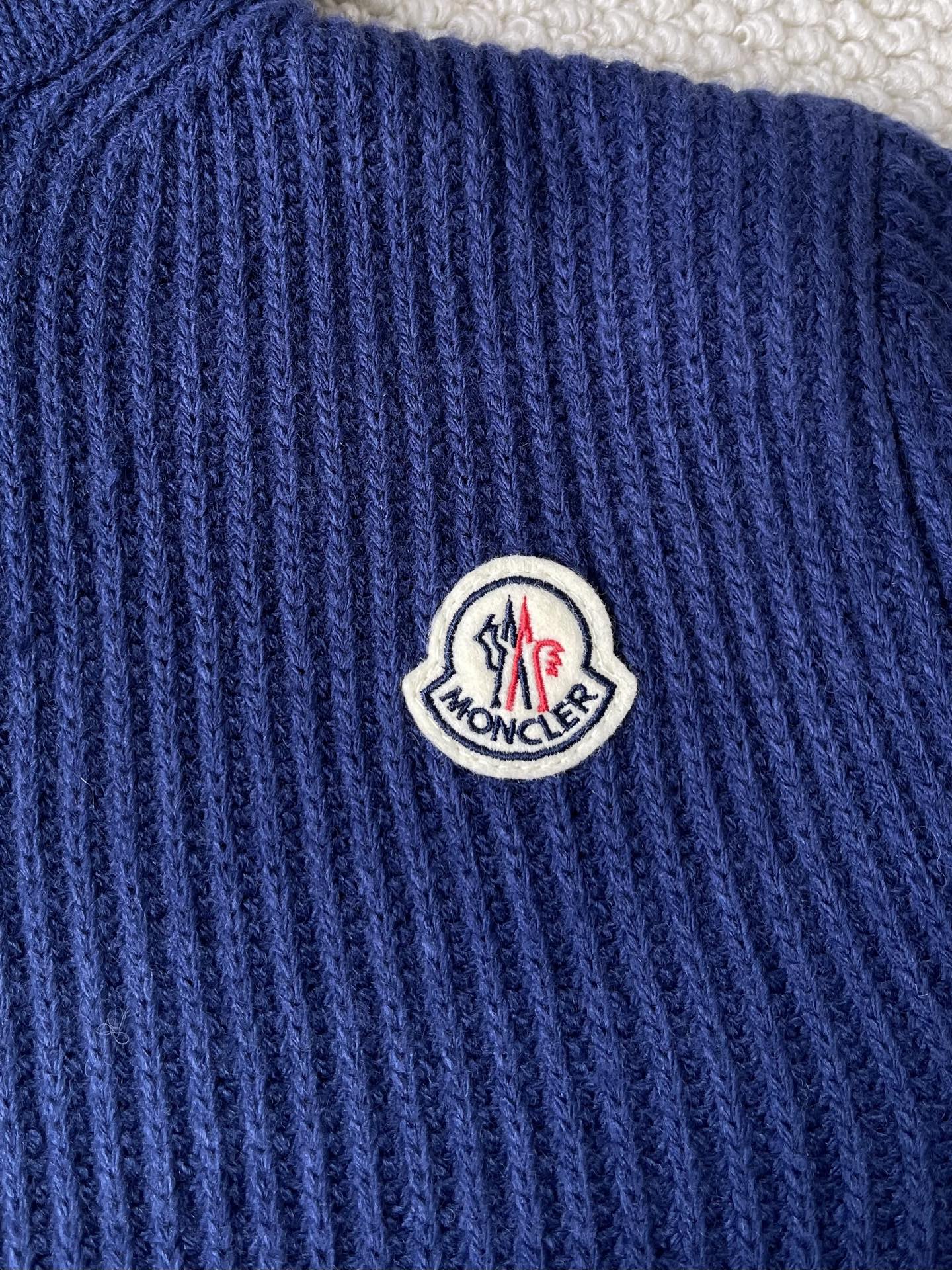 Ribbed Badge Quarter-Zip Sweater — product photograph