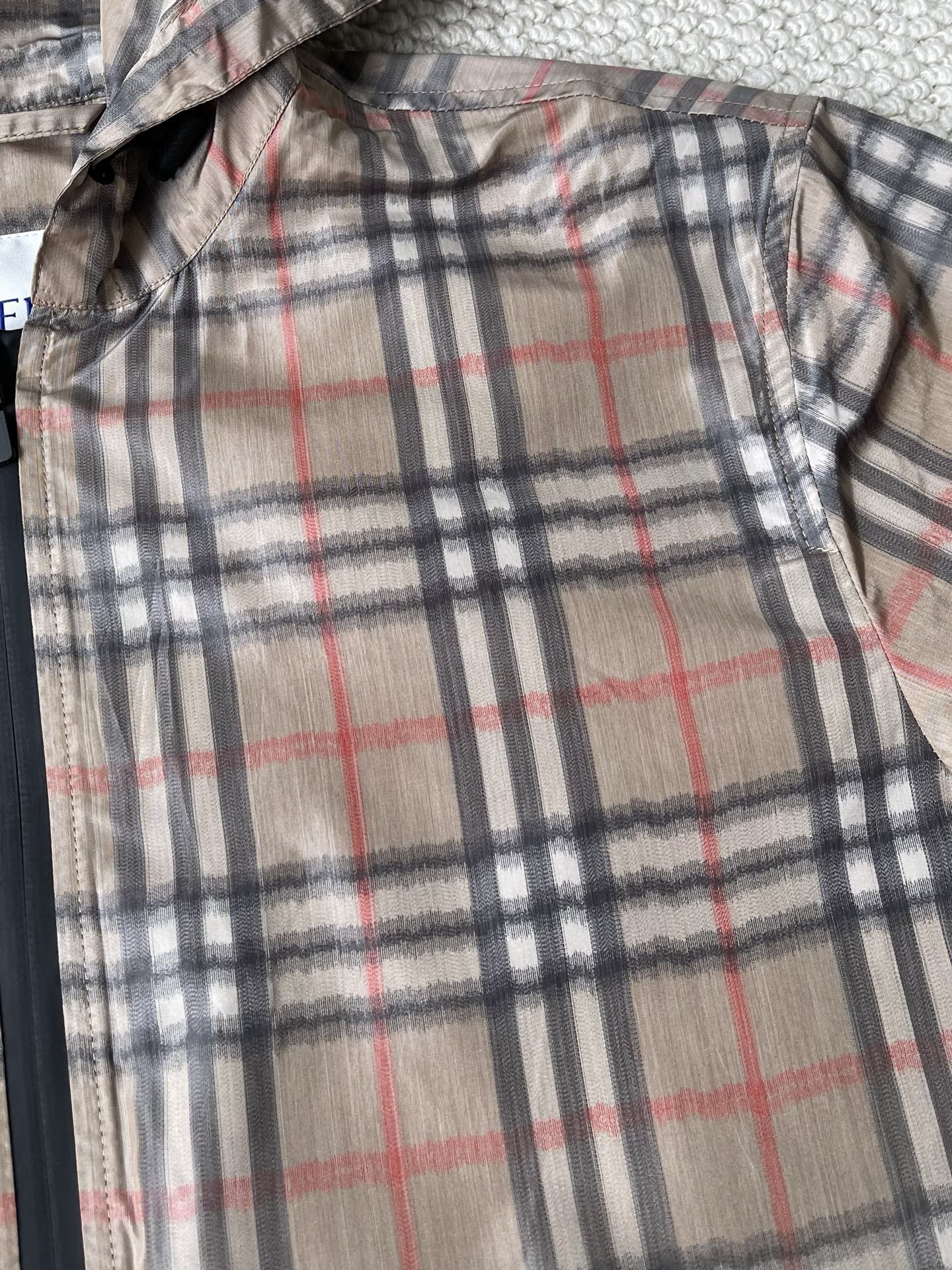 Check-Yoke Hooded Windbreaker — product photograph