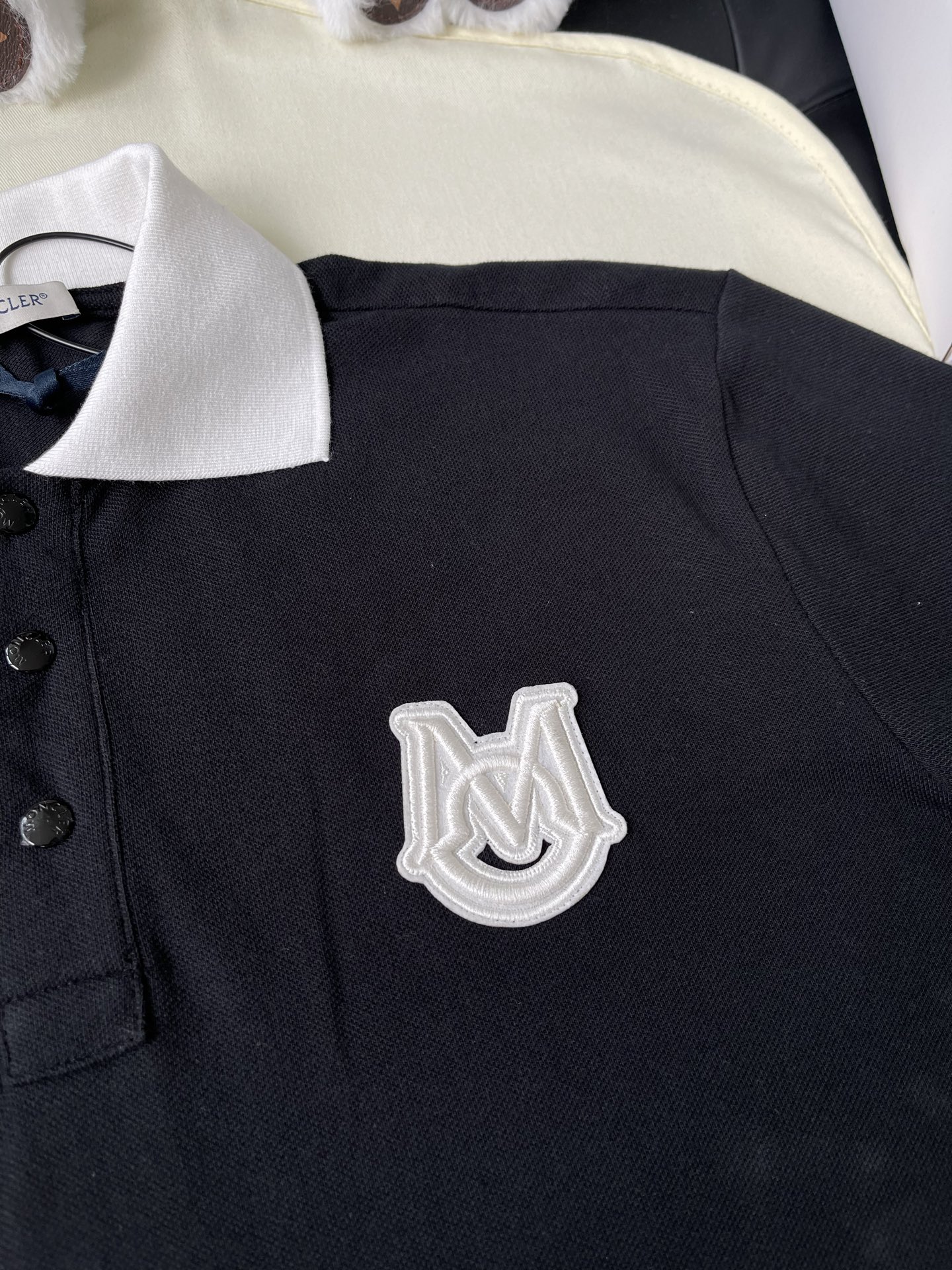 Contrast-Collar M-Crest Polo — product photograph