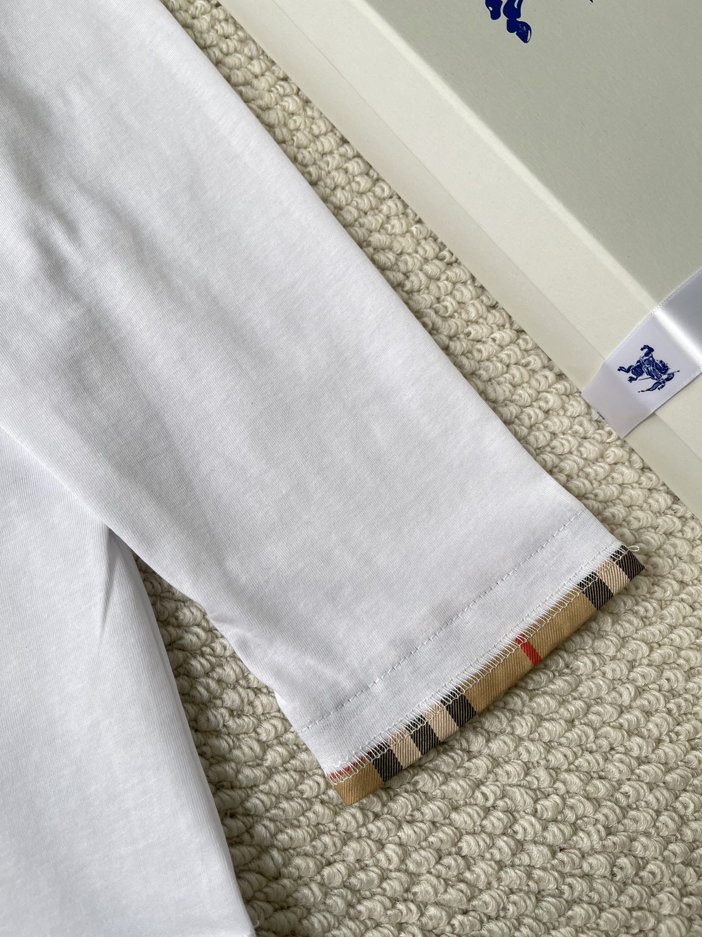 Check-Cuff Long-Sleeve Top — product photograph