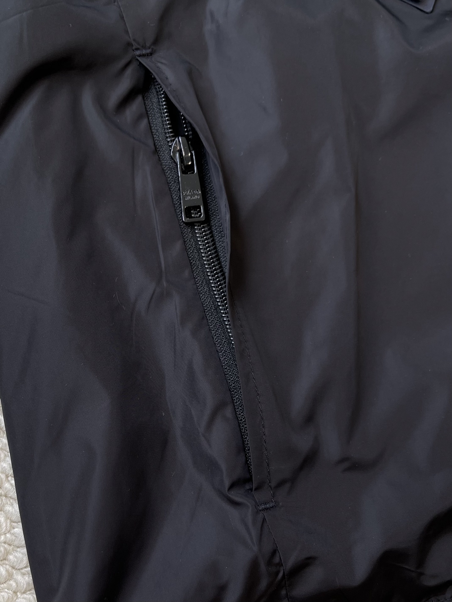 Triangle-Emblem Hooded Zip Jacket — product photograph