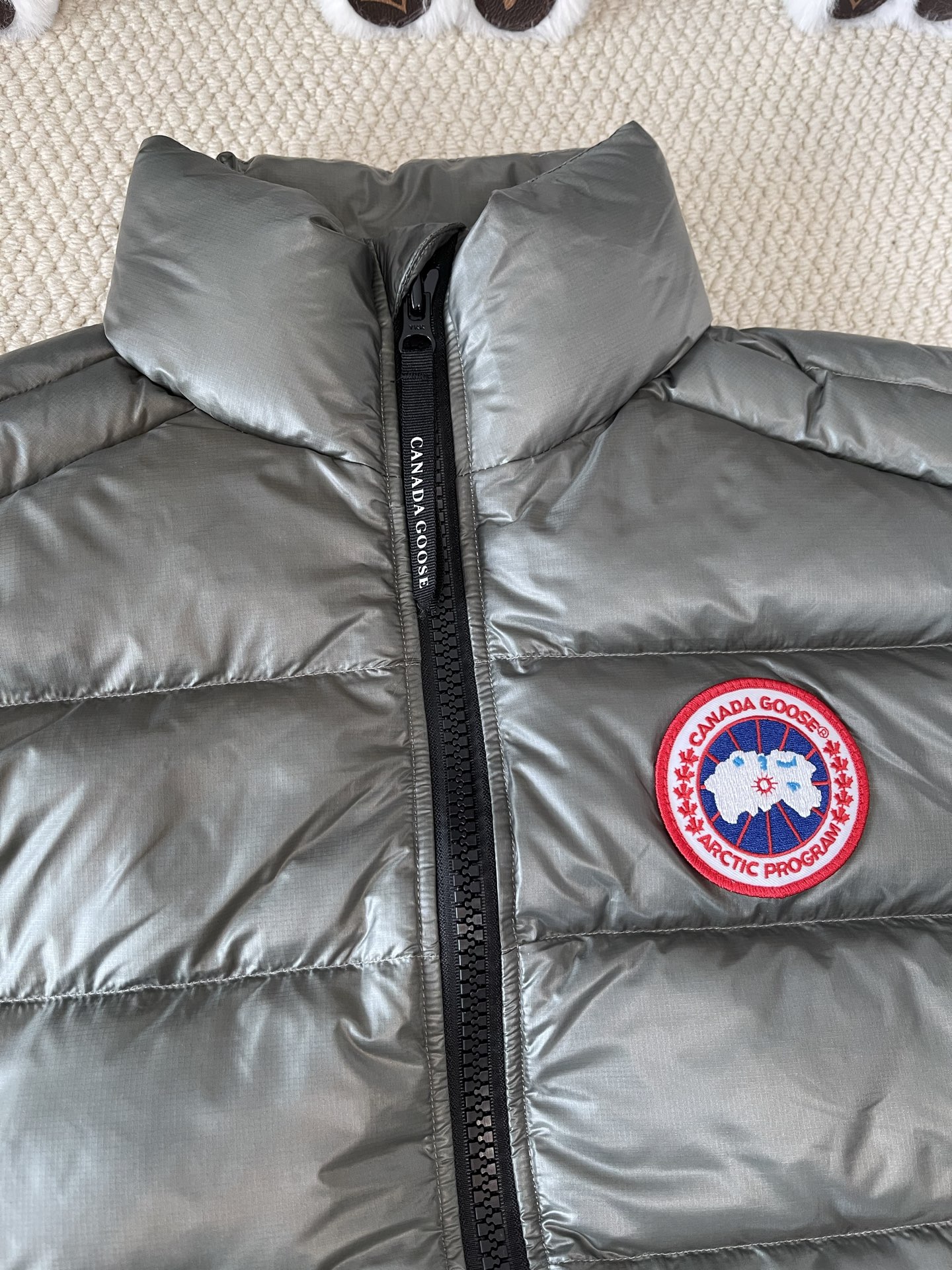 Crest-Patch Quilted Vest — product photograph