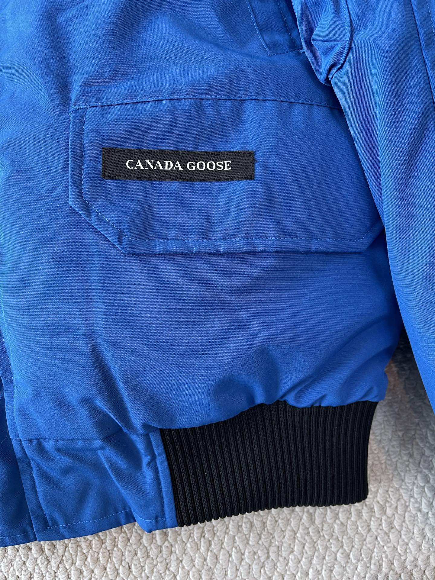 Trimmed-Hood Bomber Jacket — product photograph