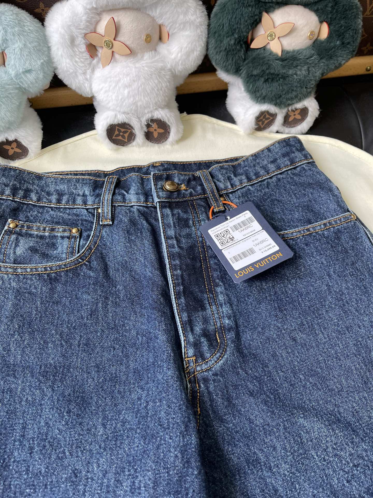 Monogram-Cuff Straight-Leg Jeans — product photograph
