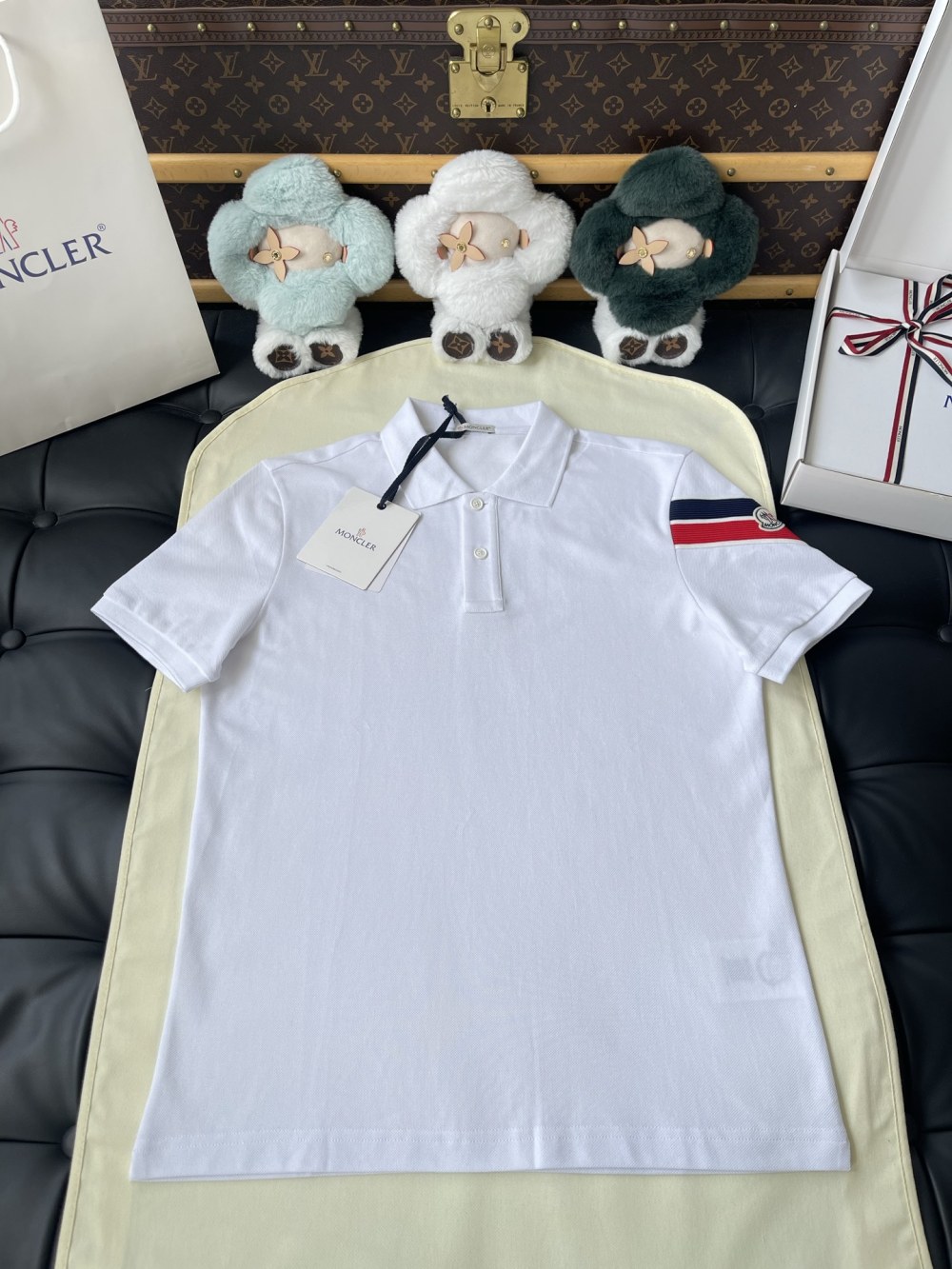 Stripe-Sleeve Badge Polo — product photograph