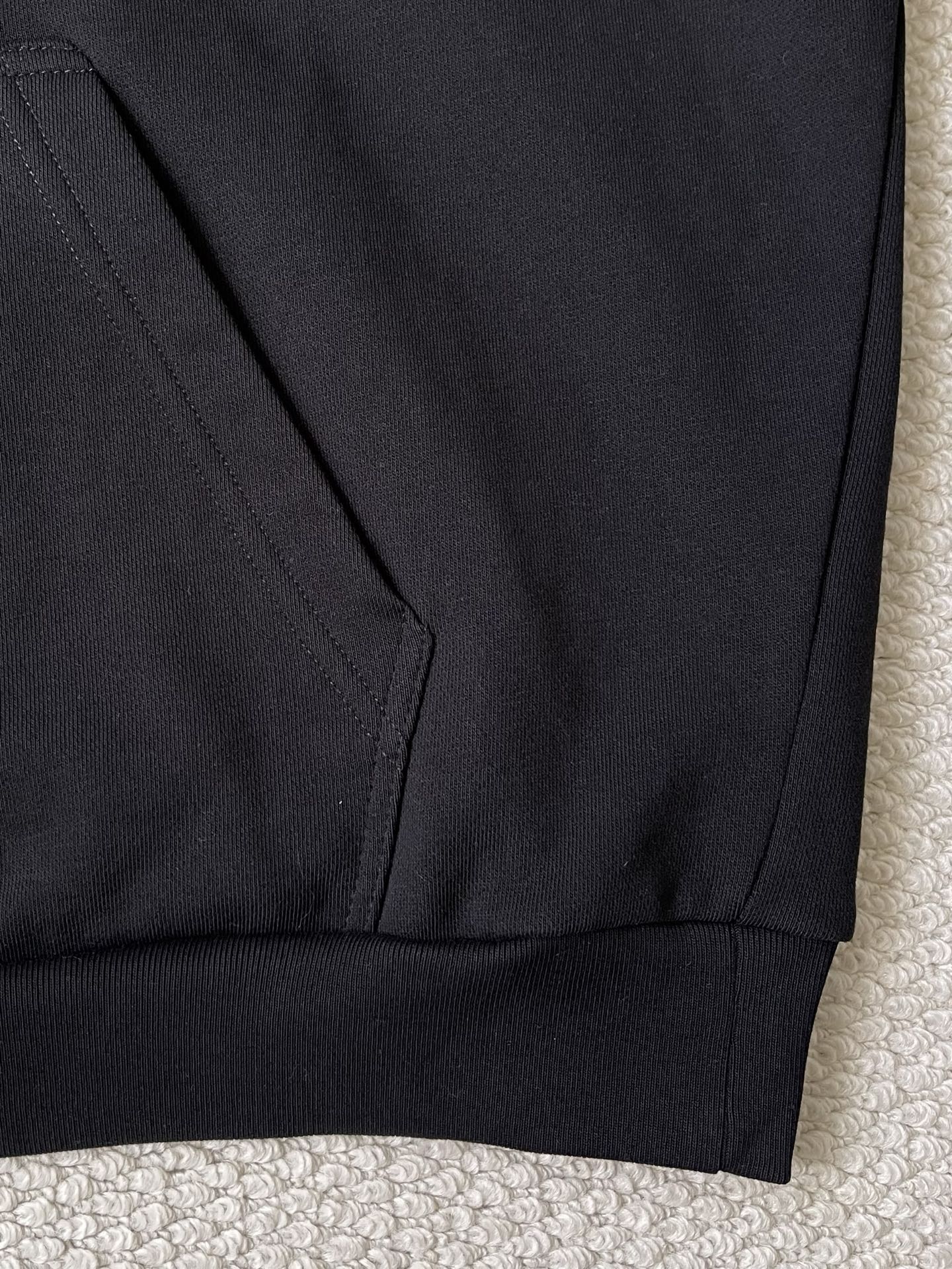 Collage-Wordmark Pullover Hoodie — product photograph