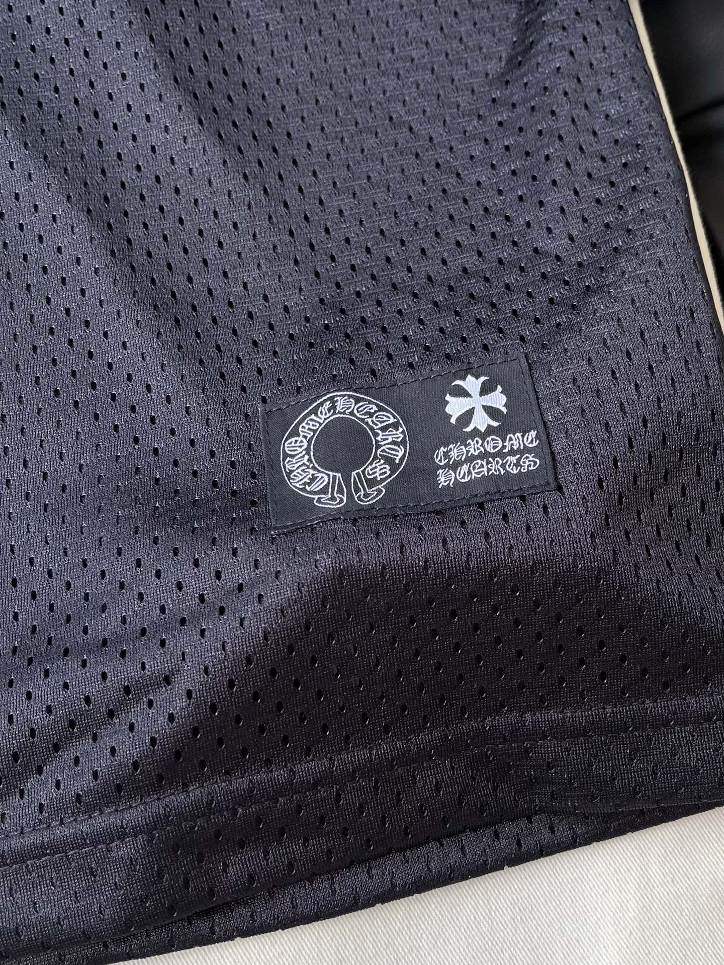 Gothic Logo V-Neck Mesh Top — product photograph
