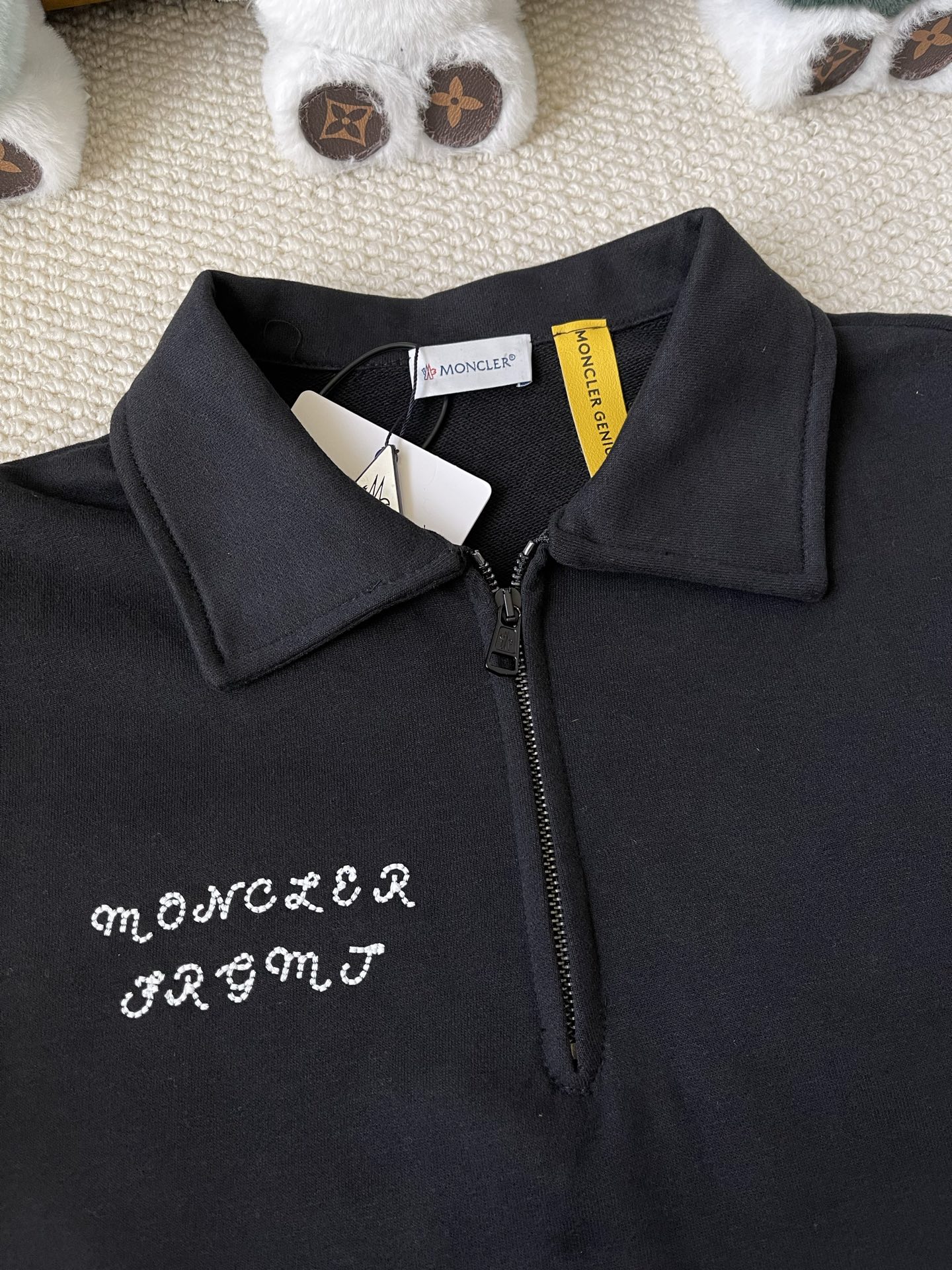 Fragment Zip-Neck Polo — product photograph