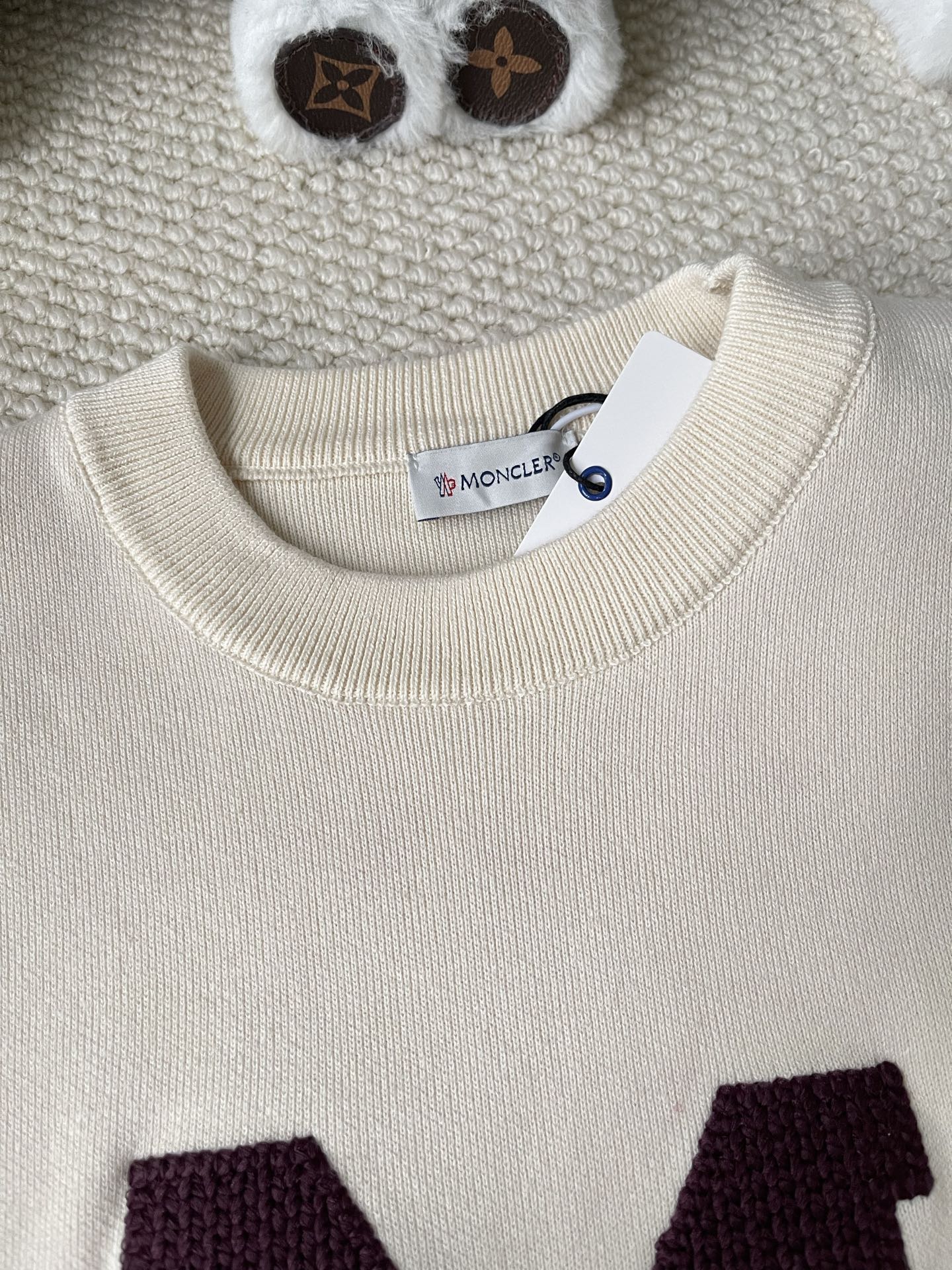 Letter-M Crewneck Sweater — product photograph